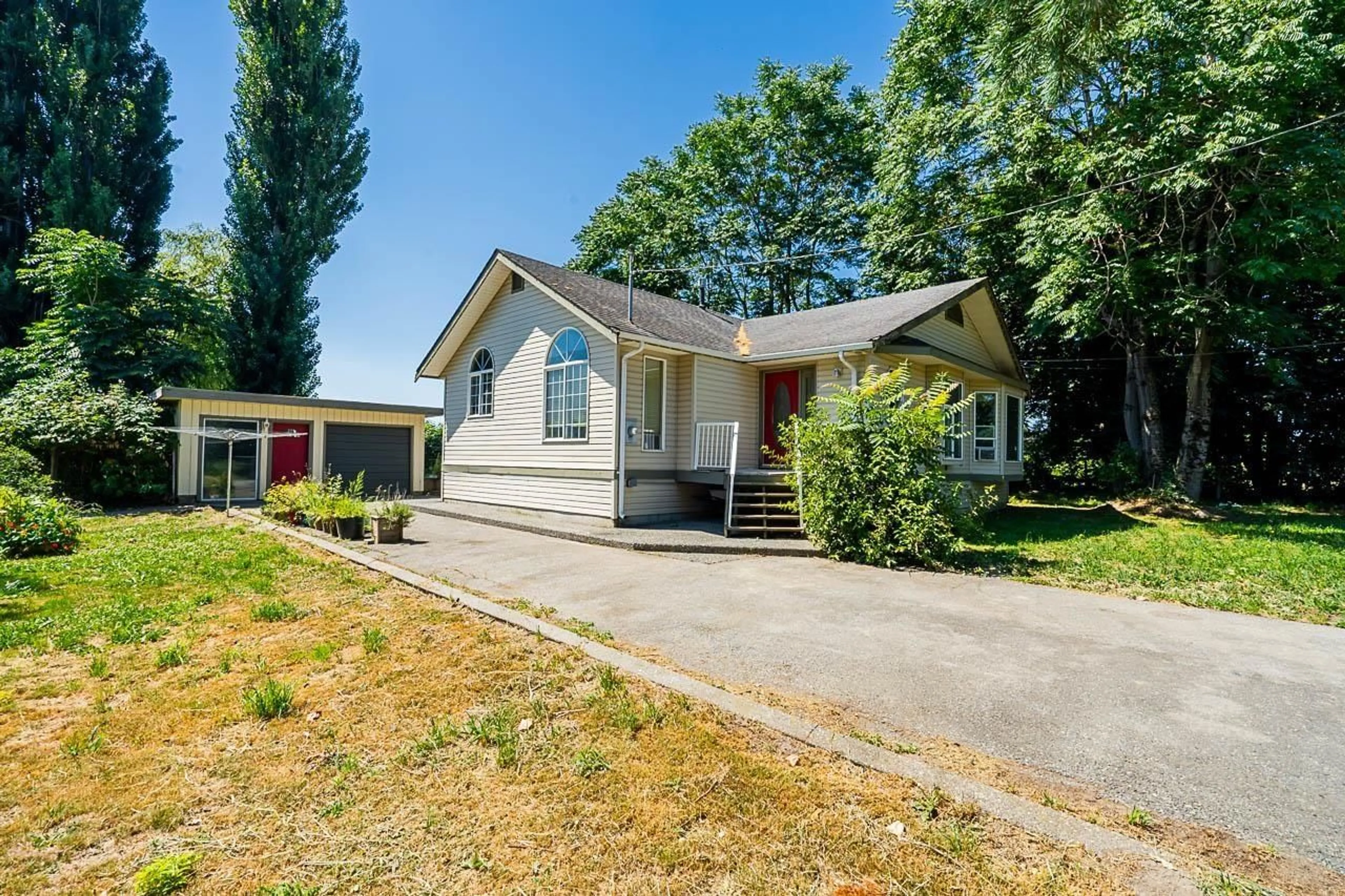 A pic from outside/outdoor area/front of a property/back of a property/a pic from drone, street for 42050 KEITH WILSON ROAD, Sardis - Greendale British Columbia V2R4B2