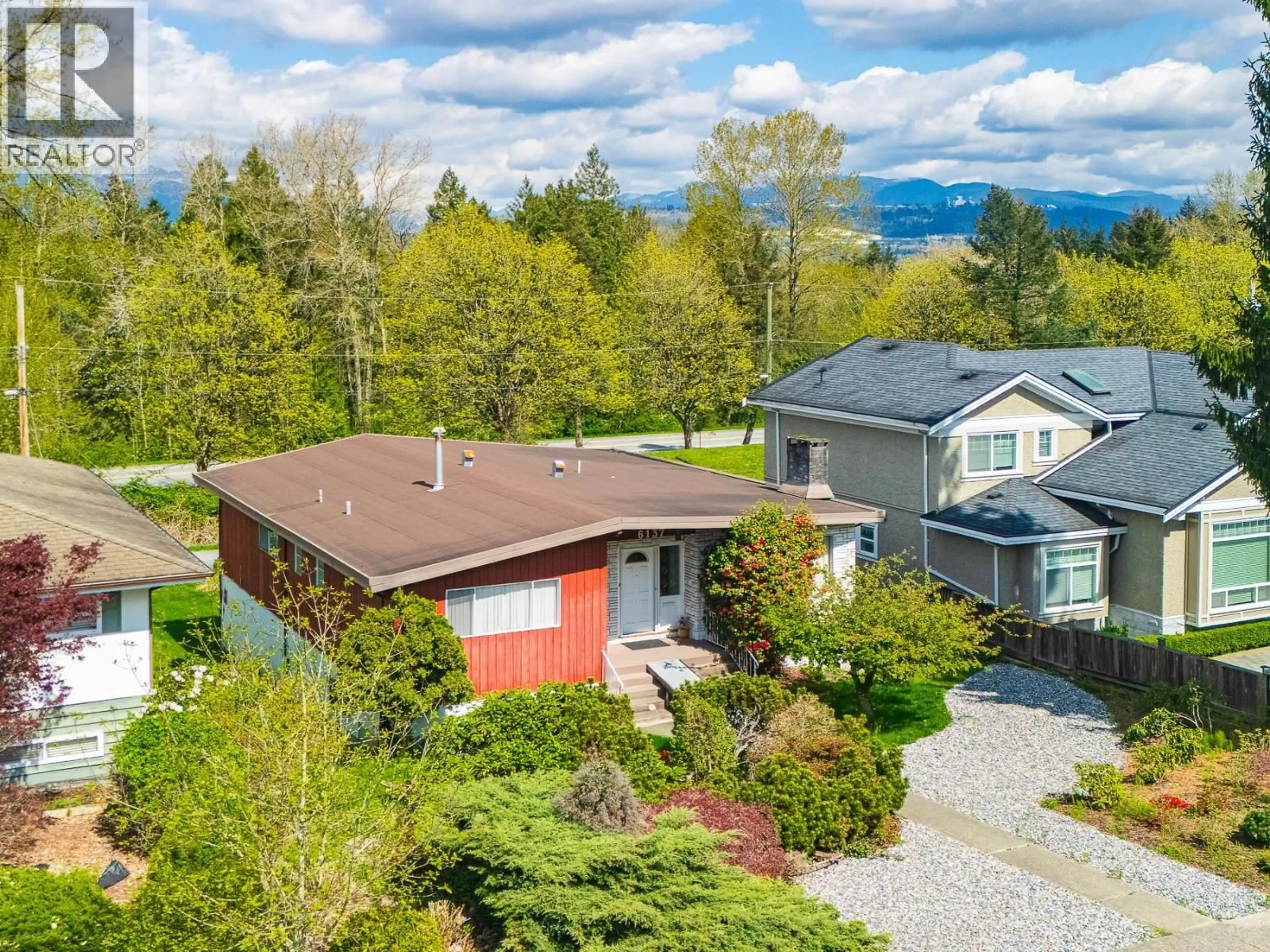 A pic from outside/outdoor area/front of a property/back of a property/a pic from drone, mountain view for 6137 SERVICE STREET, Burnaby British Columbia V5H1V7