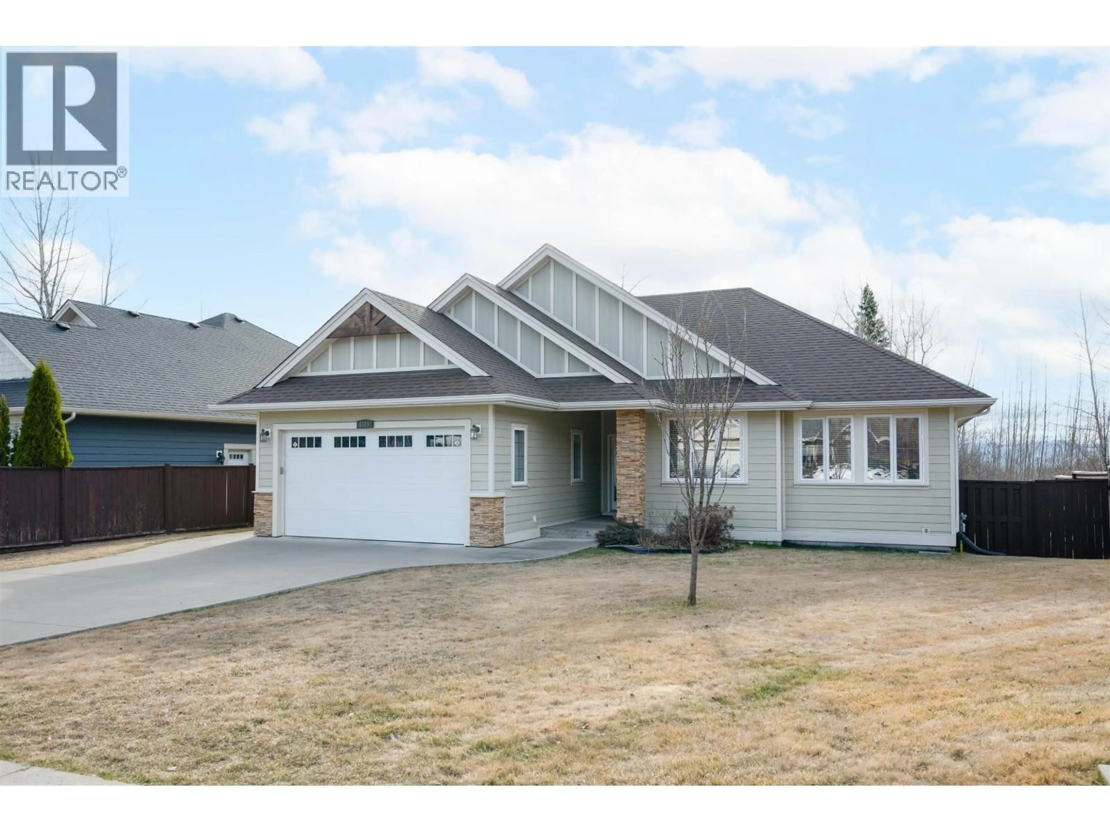 Home with vinyl exterior material, street for 4589 UNIVERSITY HEIGHTS DRIVE, Prince George British Columbia V2N0B9