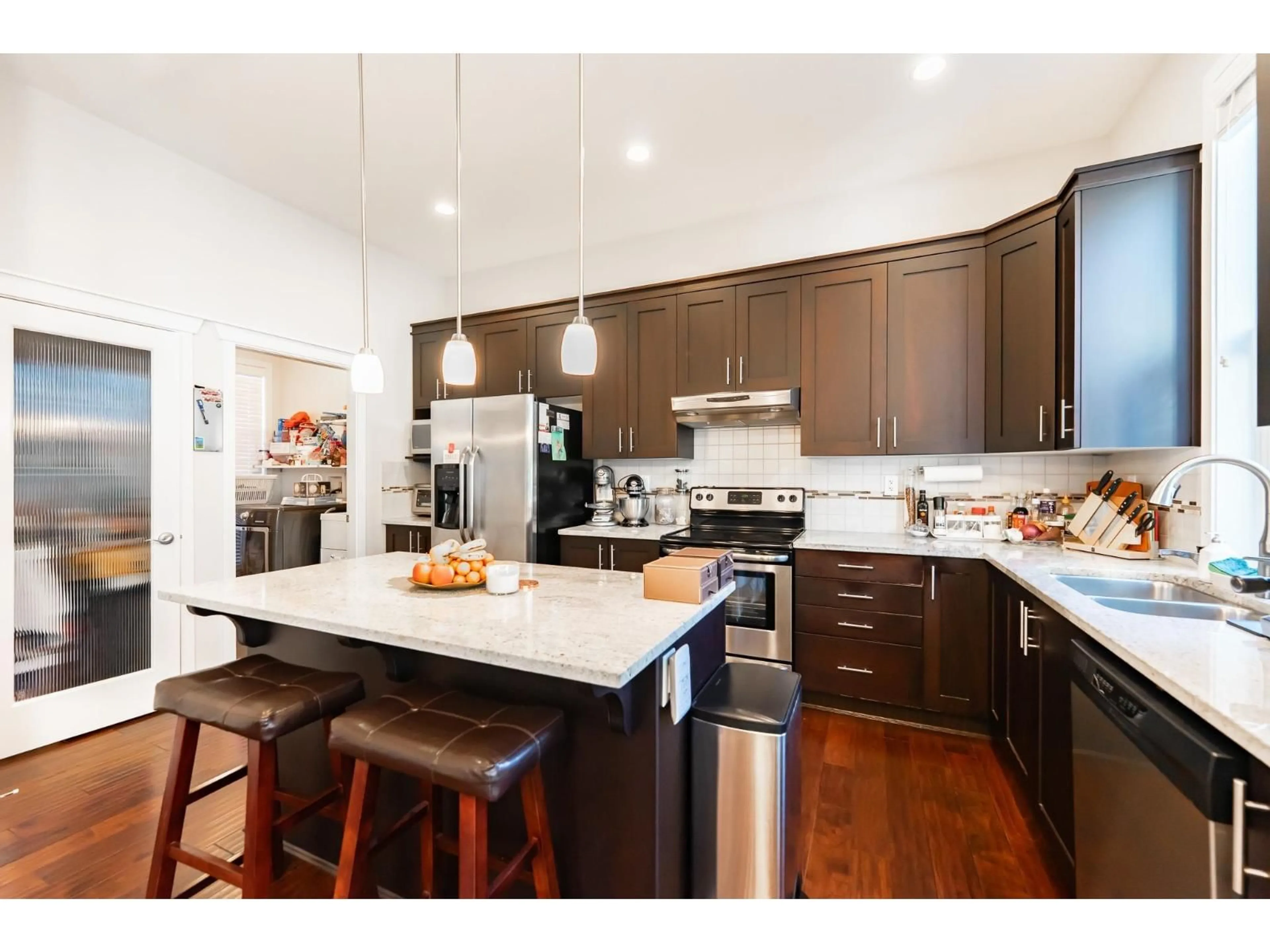 Open concept kitchen, wood/laminate floor for 16919 79 AVENUE, Surrey British Columbia V4N6L4