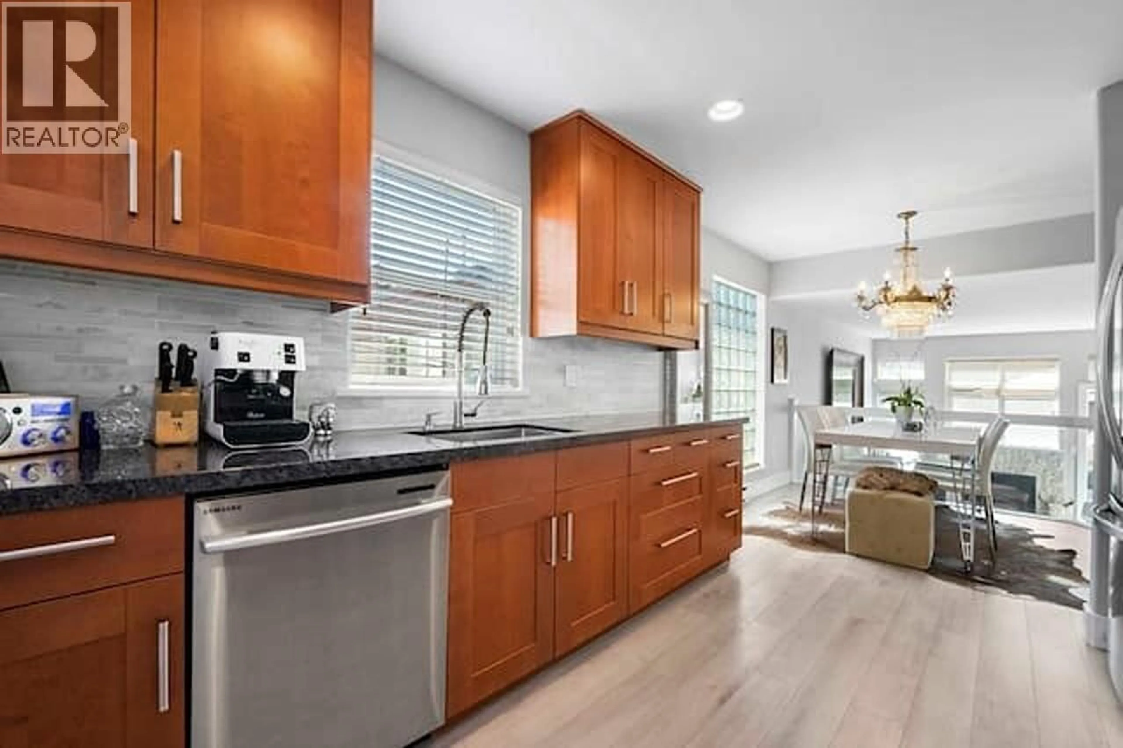 Open concept kitchen, ceramic/tile floor for D - 136 4TH STREET, North Vancouver British Columbia V7M1H5