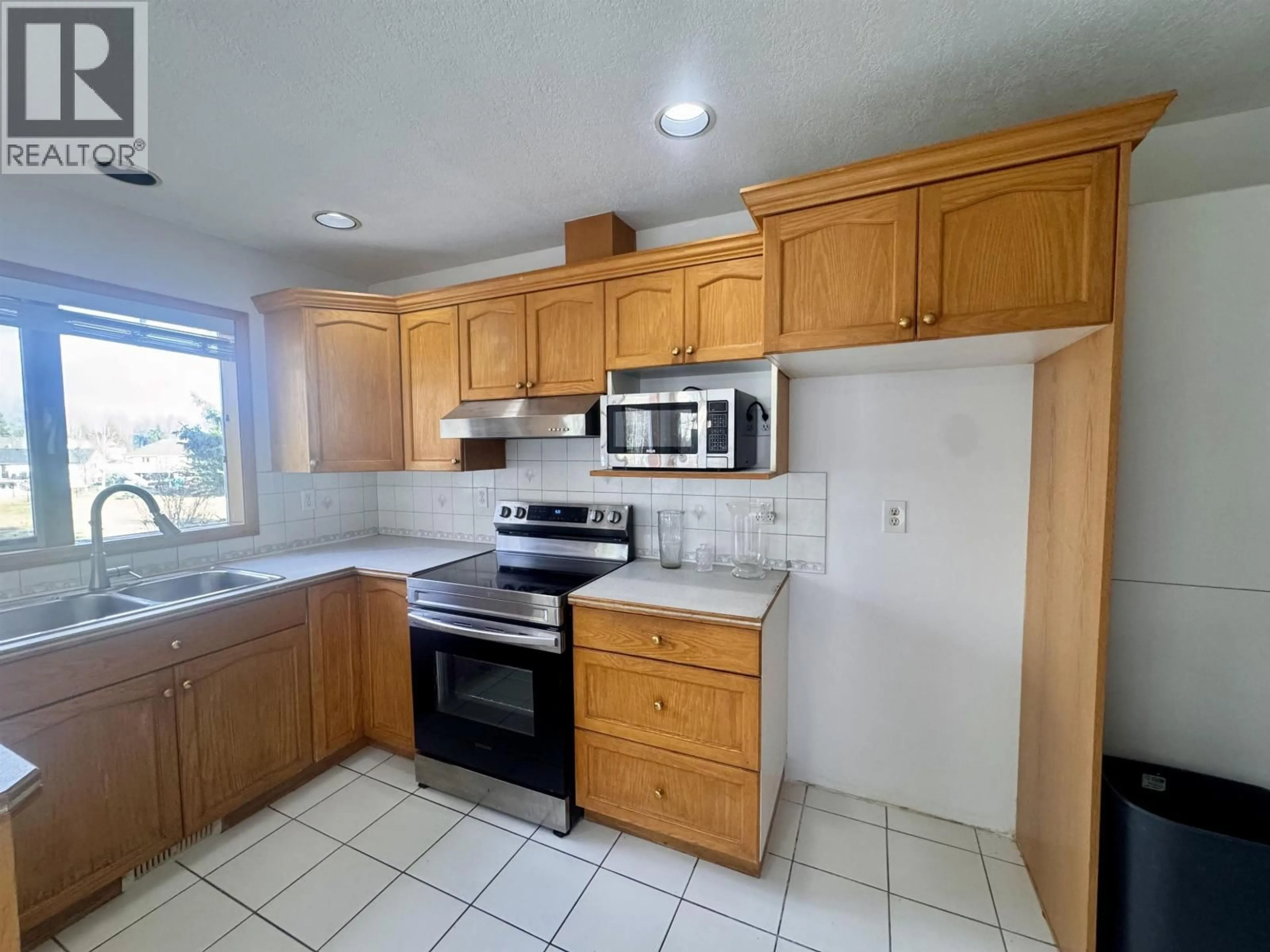 Standard kitchen, ceramic/tile floor for 4412 BAKER ROAD, Prince George British Columbia V2N5H6