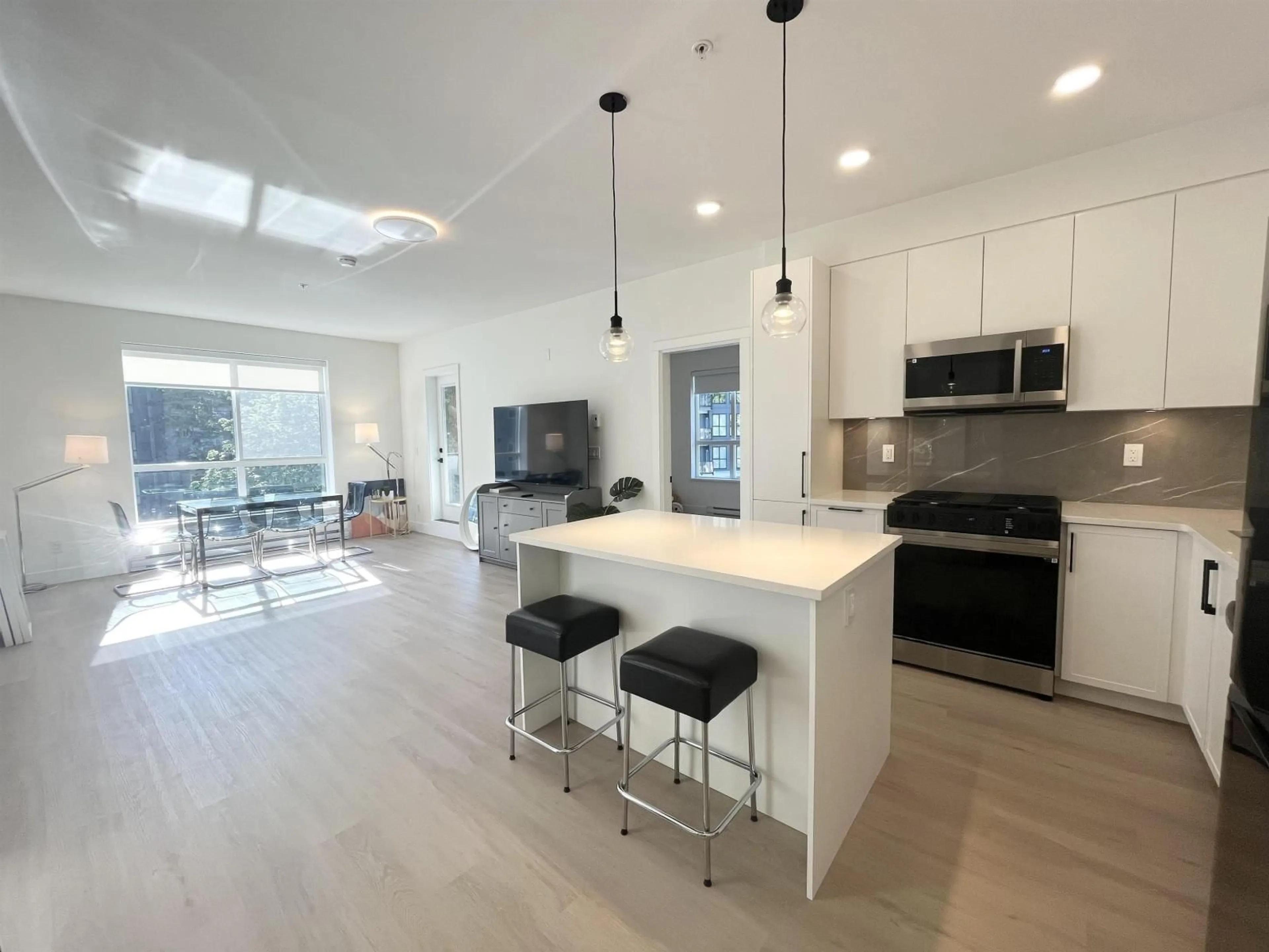 Open concept kitchen, unknown for 416 - 3528 146A STREET, Surrey British Columbia V4P0H4