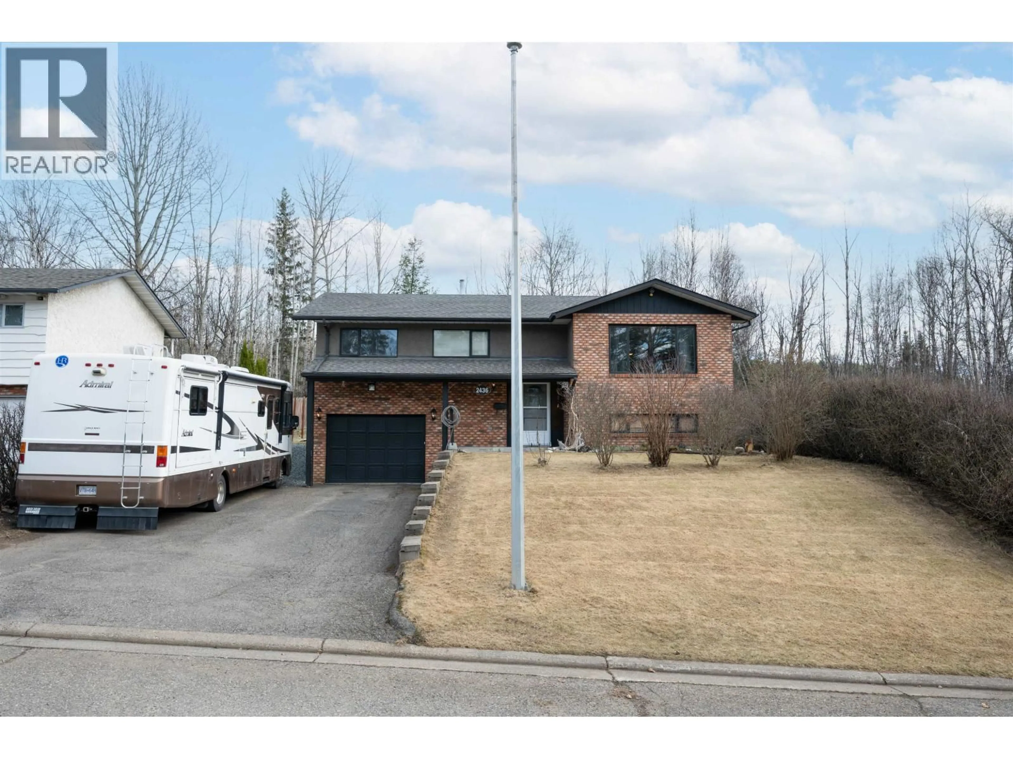 Home with brick exterior material, street for 2436 MOSS AVENUE, Prince George British Columbia V2L5J3