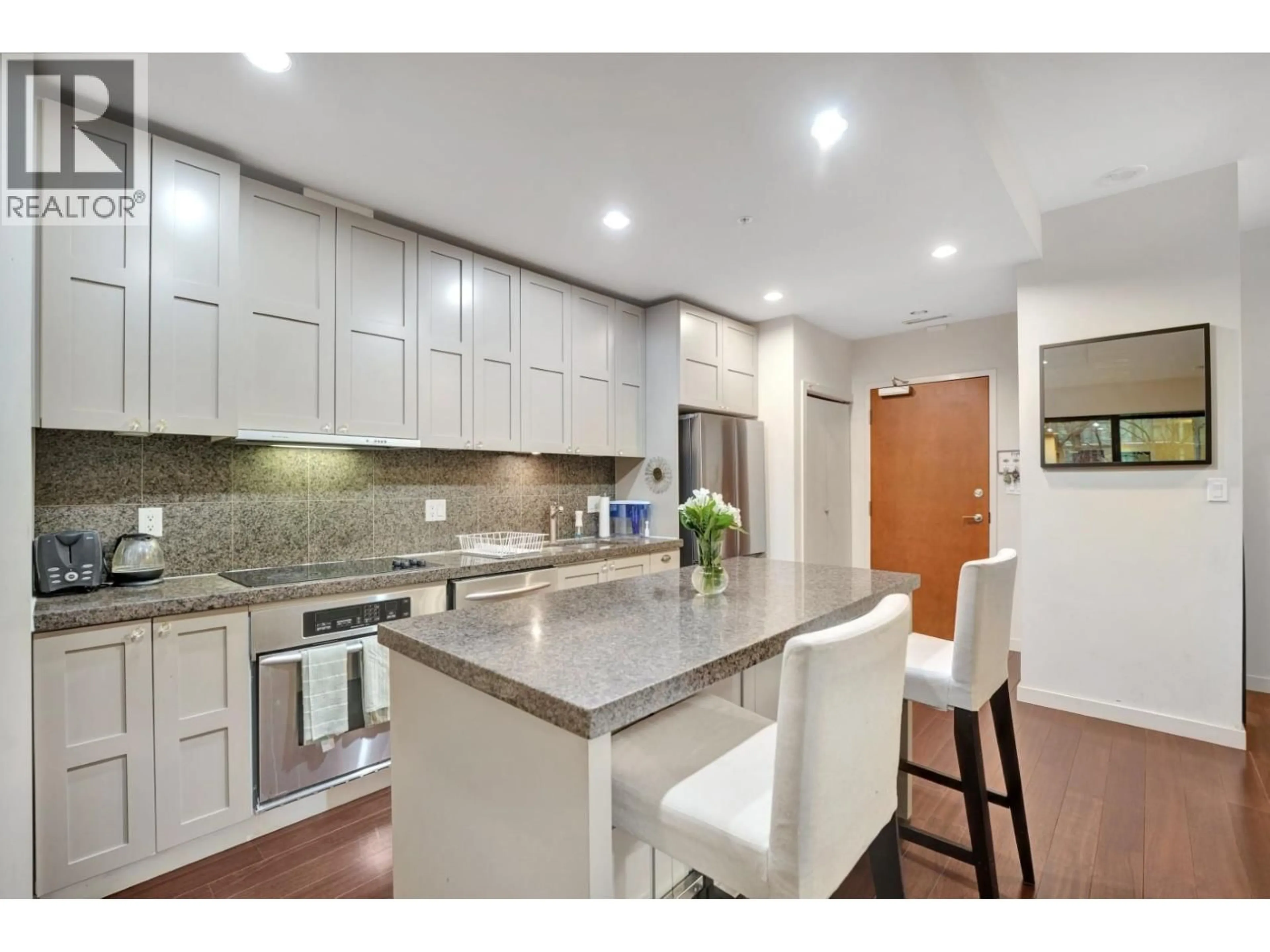 Open concept kitchen, ceramic/tile floor for 407 - 1333 GEORGIA STREET, Vancouver British Columbia V6E4V3