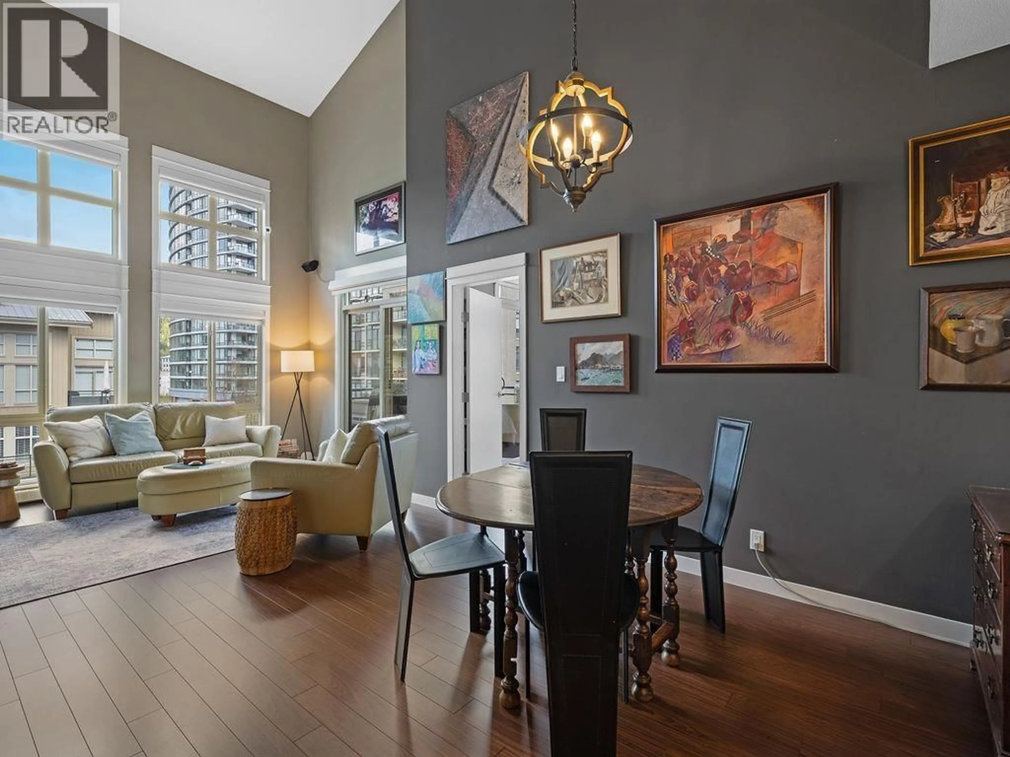 Dining room, wood/laminate floor for 408 - 201 MORRISSEY ROAD, Port Moody British Columbia V3H0E5