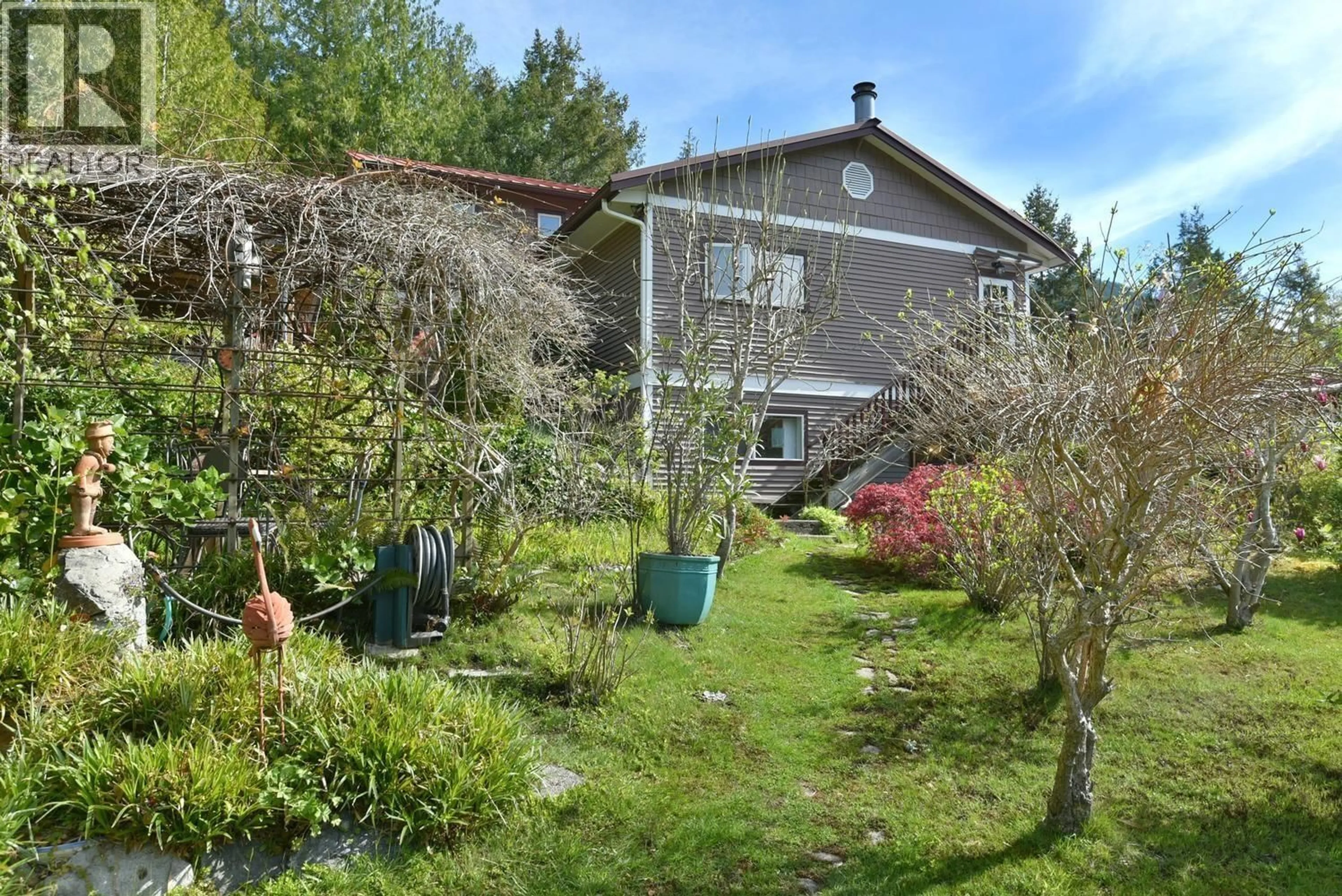 A pic from outside/outdoor area/front of a property/back of a property/a pic from drone, unknown for 4906 SINCLAIR BAY ROAD, Garden Bay British Columbia V0N1S1