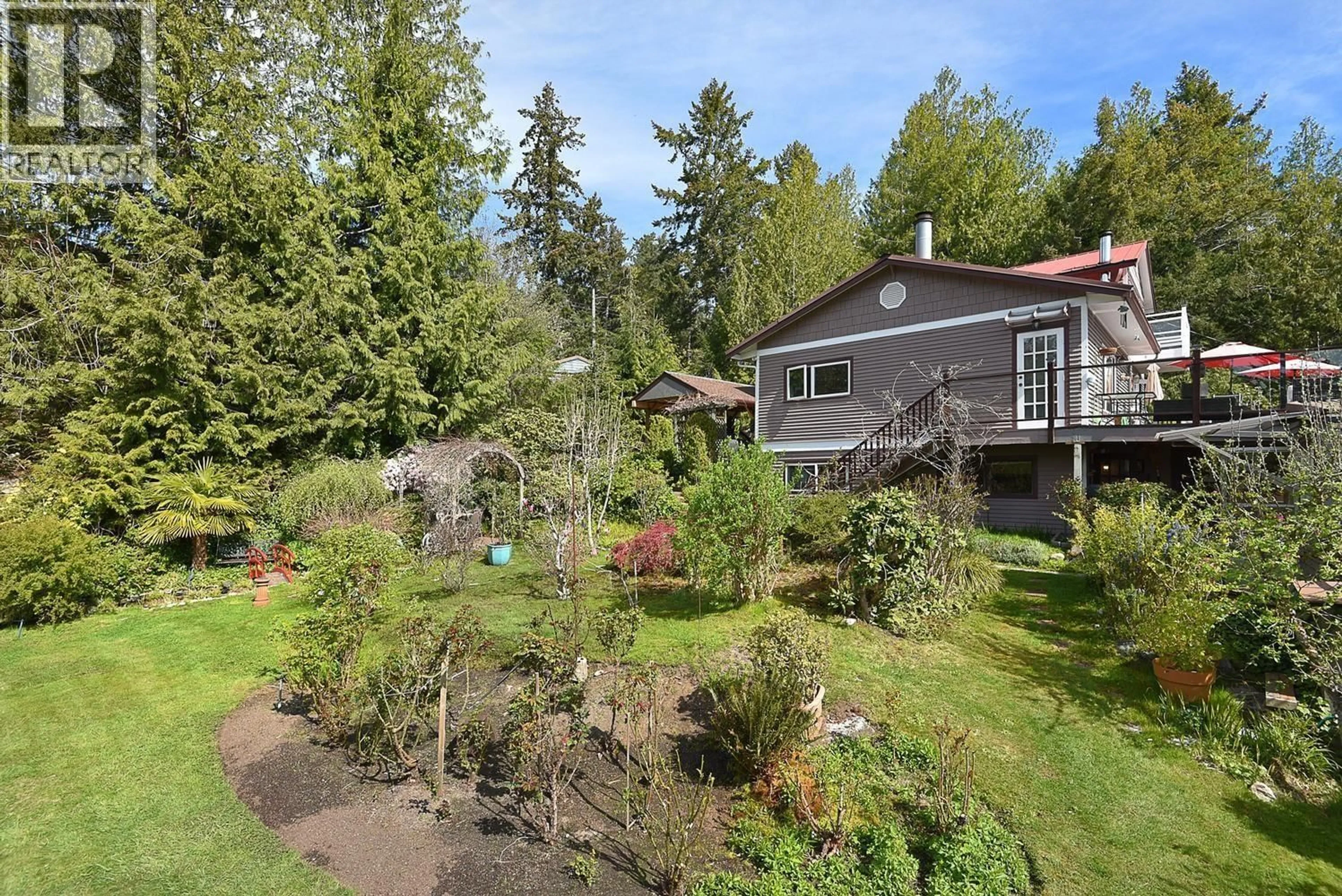 A pic from outside/outdoor area/front of a property/back of a property/a pic from drone, unknown for 4906 SINCLAIR BAY ROAD, Garden Bay British Columbia V0N1S1
