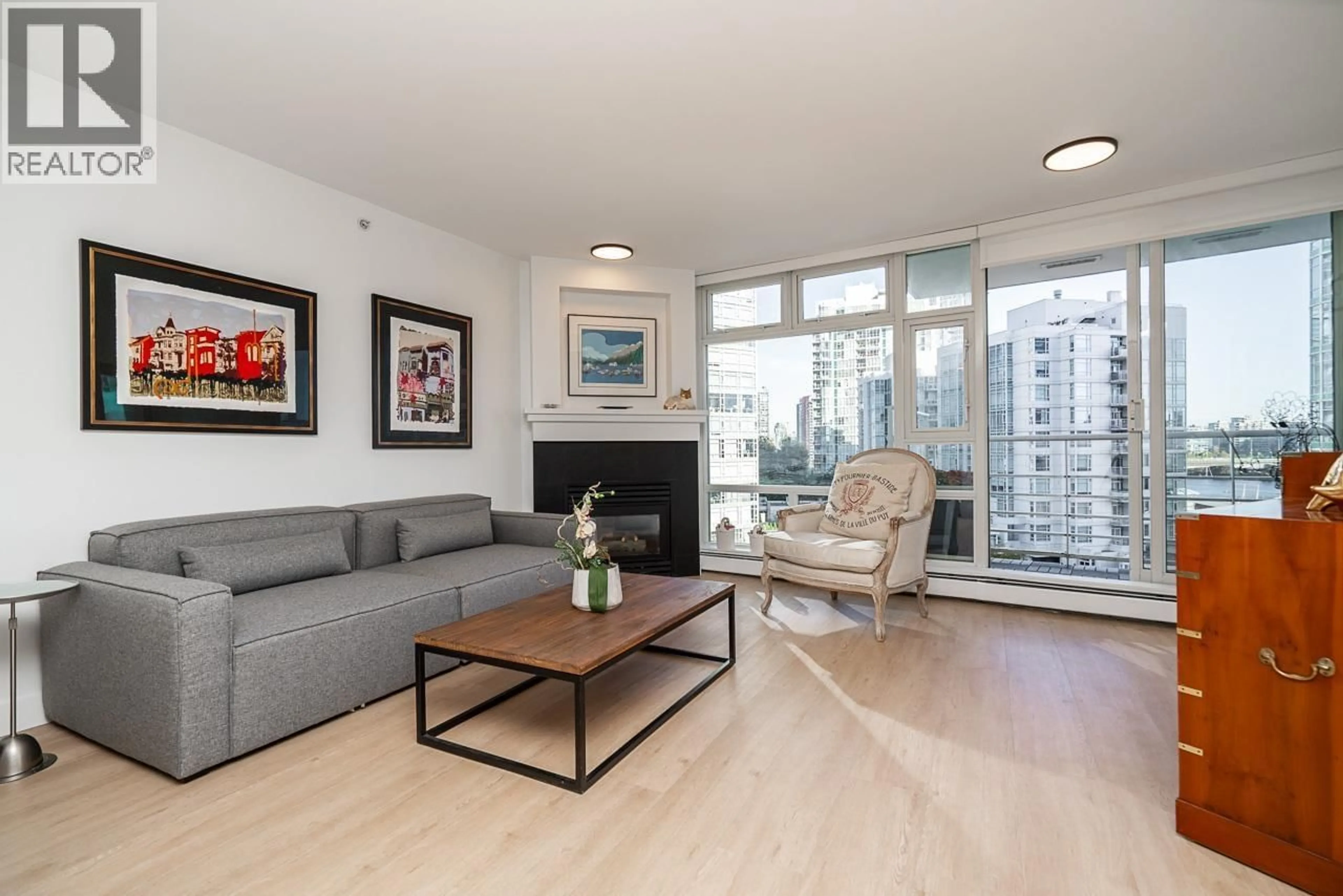 Living room with furniture, wood/laminate floor for 906 - 189 DAVIE STREET, Vancouver British Columbia V6Z2X9