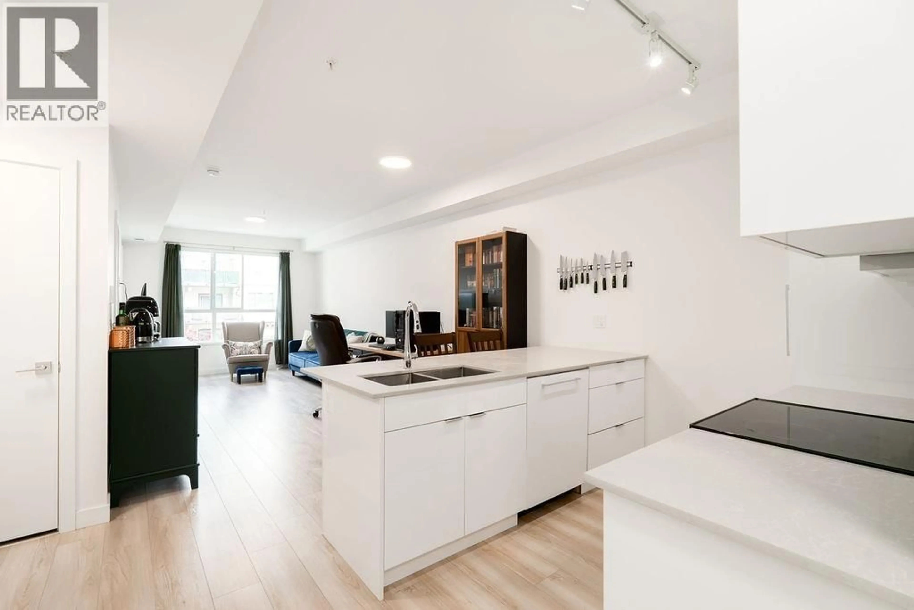 Open concept kitchen, wood/laminate floor for 208 - 11913 BURNETT STREET, Maple Ridge British Columbia V2X4N1