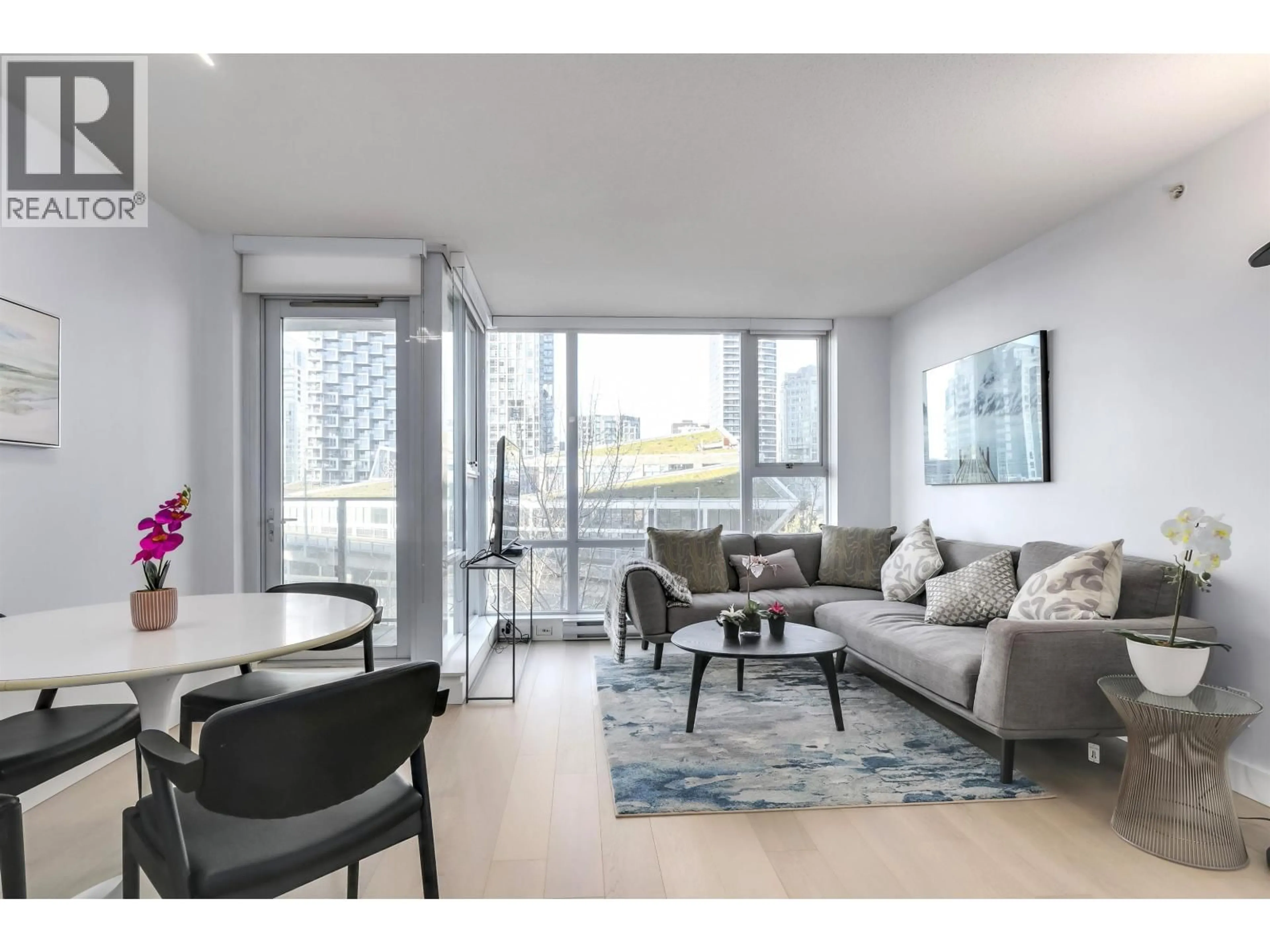 Living room with furniture, wood/laminate floor for 805 - 550 PACIFIC STREET, Vancouver British Columbia V6Z3G2