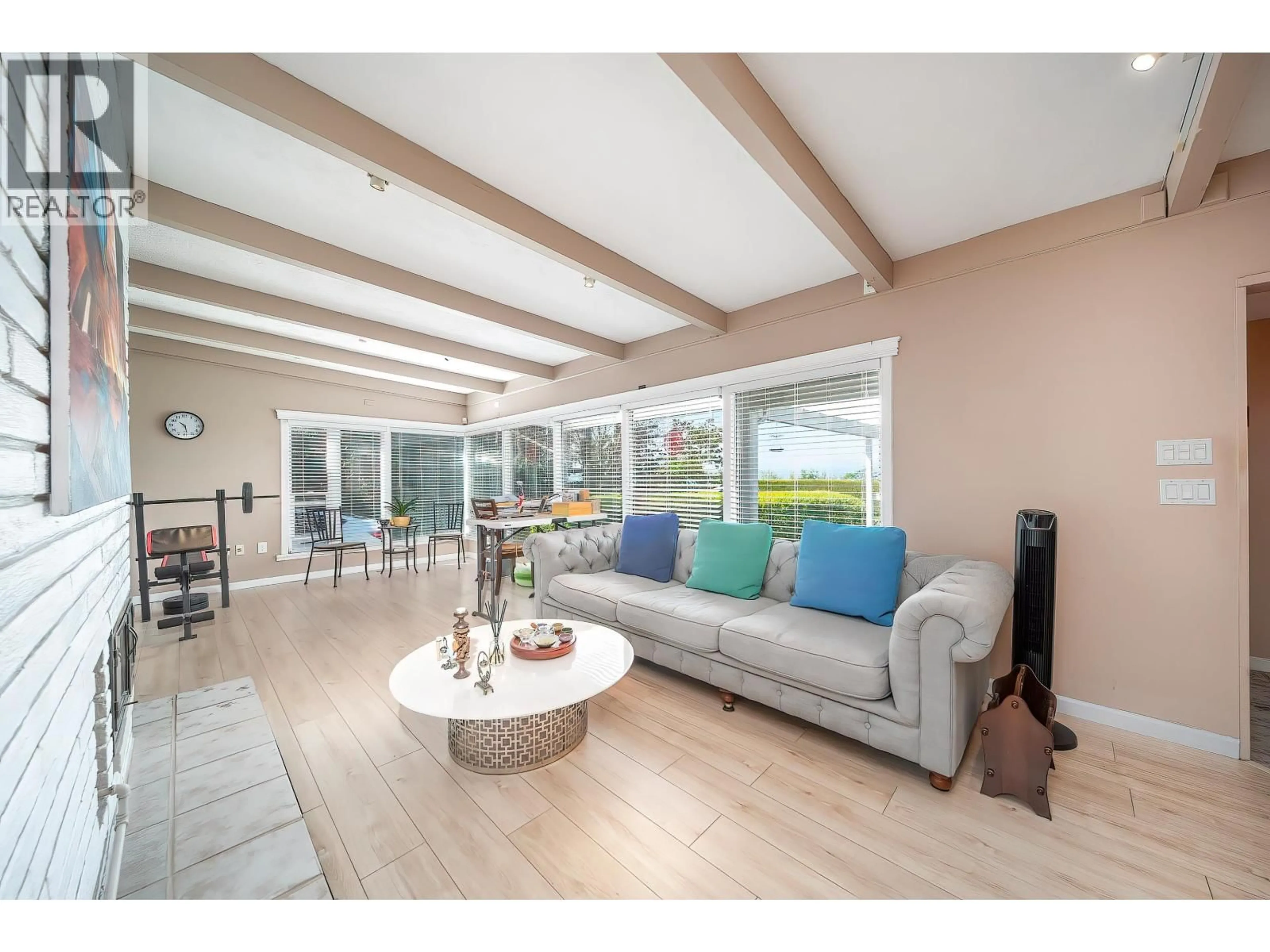 Living room with furniture, wood/laminate floor for 122 GRAHAM DRIVE, Delta British Columbia V4M2J5