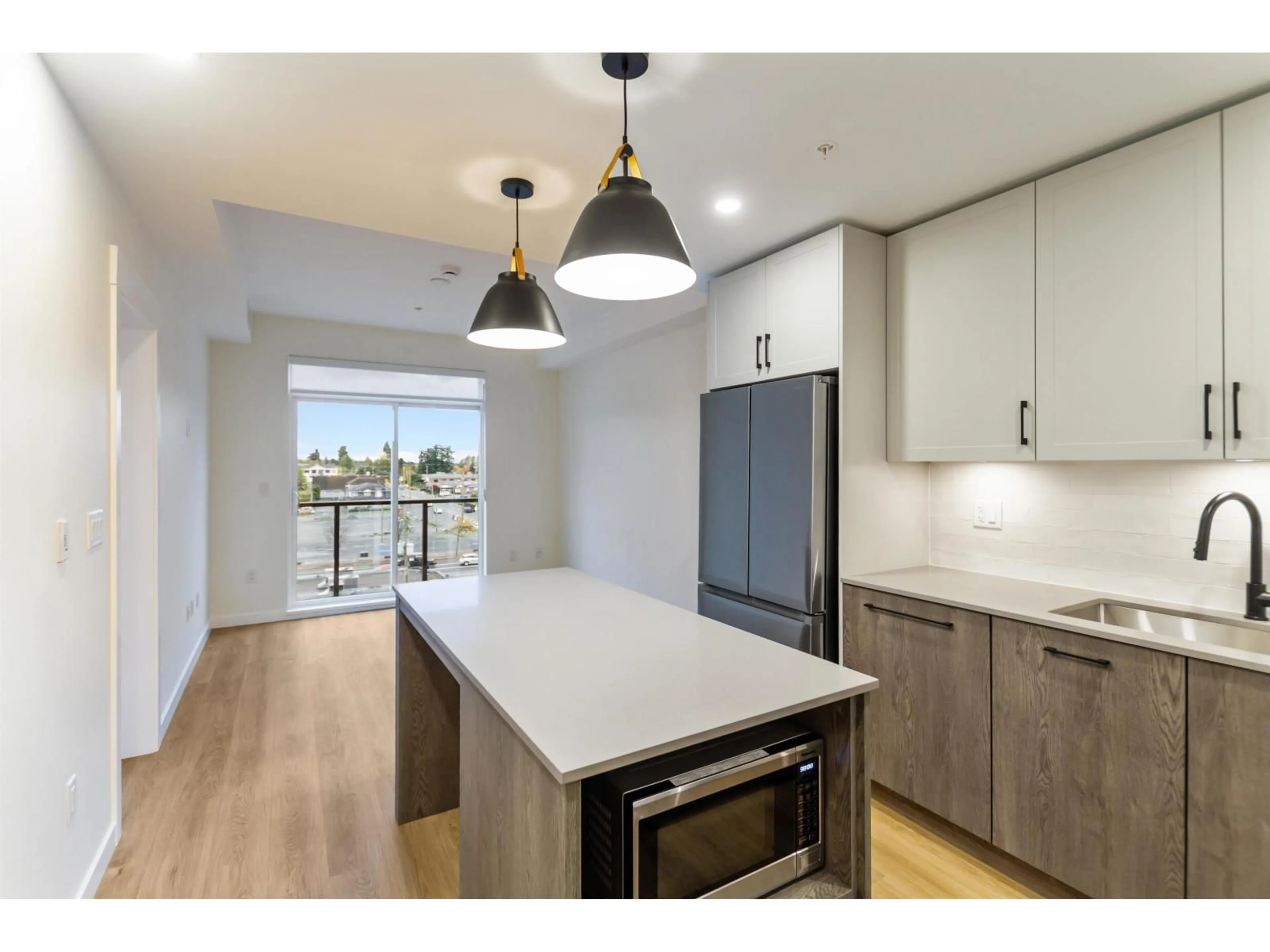 Open concept kitchen, unknown for 513 - 27218 ALDERGROVE TOWN CENTRE DRIVE, Langley British Columbia V4W0E4