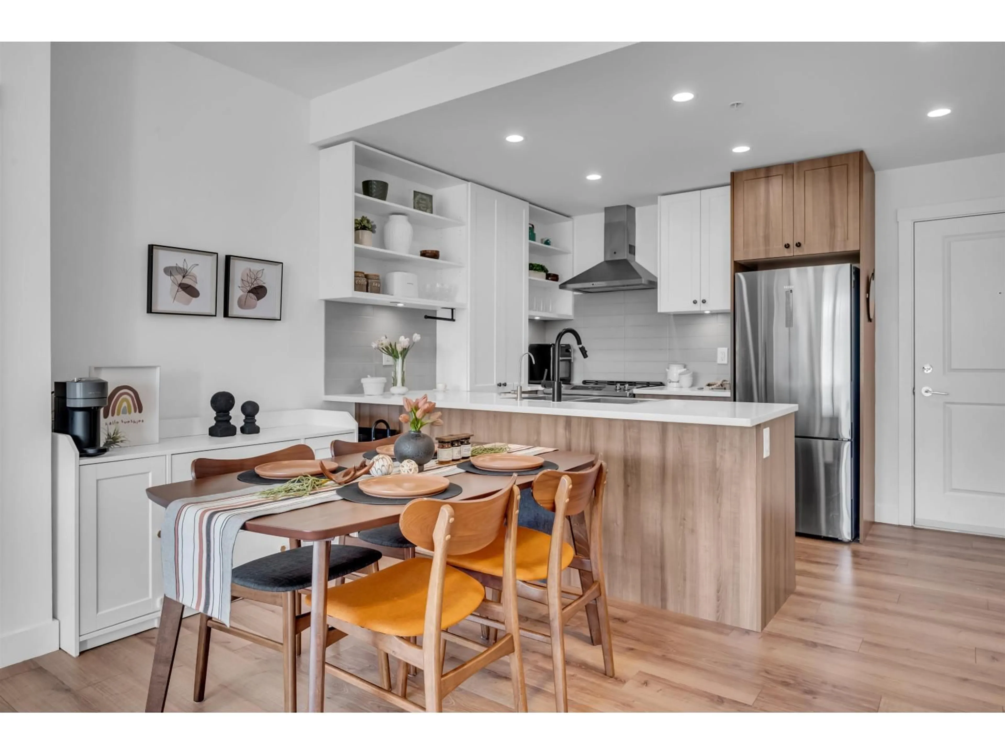 Open concept kitchen, wood/laminate floor for B209 - 20487 65 AVENUE, Langley British Columbia V2Y3K6