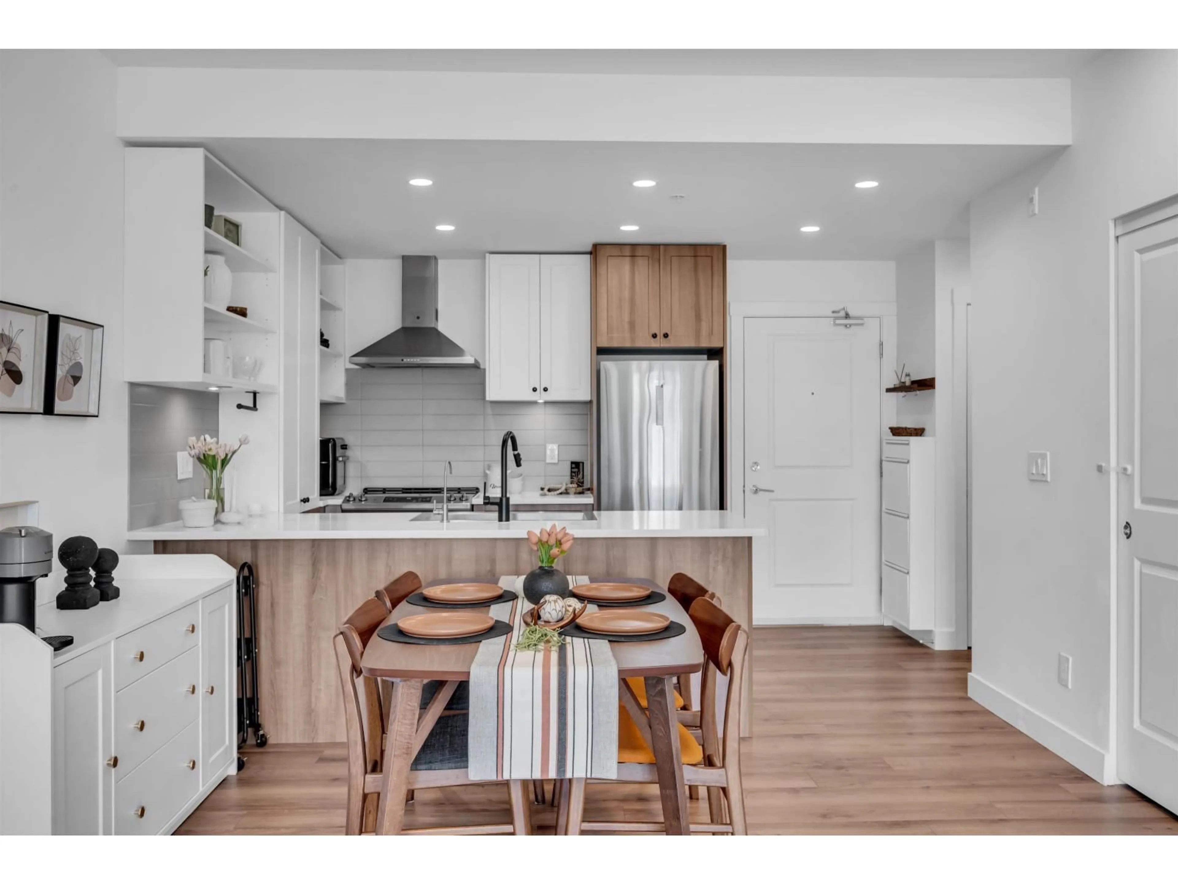 Open concept kitchen, wood/laminate floor for B209 - 20487 65 AVENUE, Langley British Columbia V2Y3K6