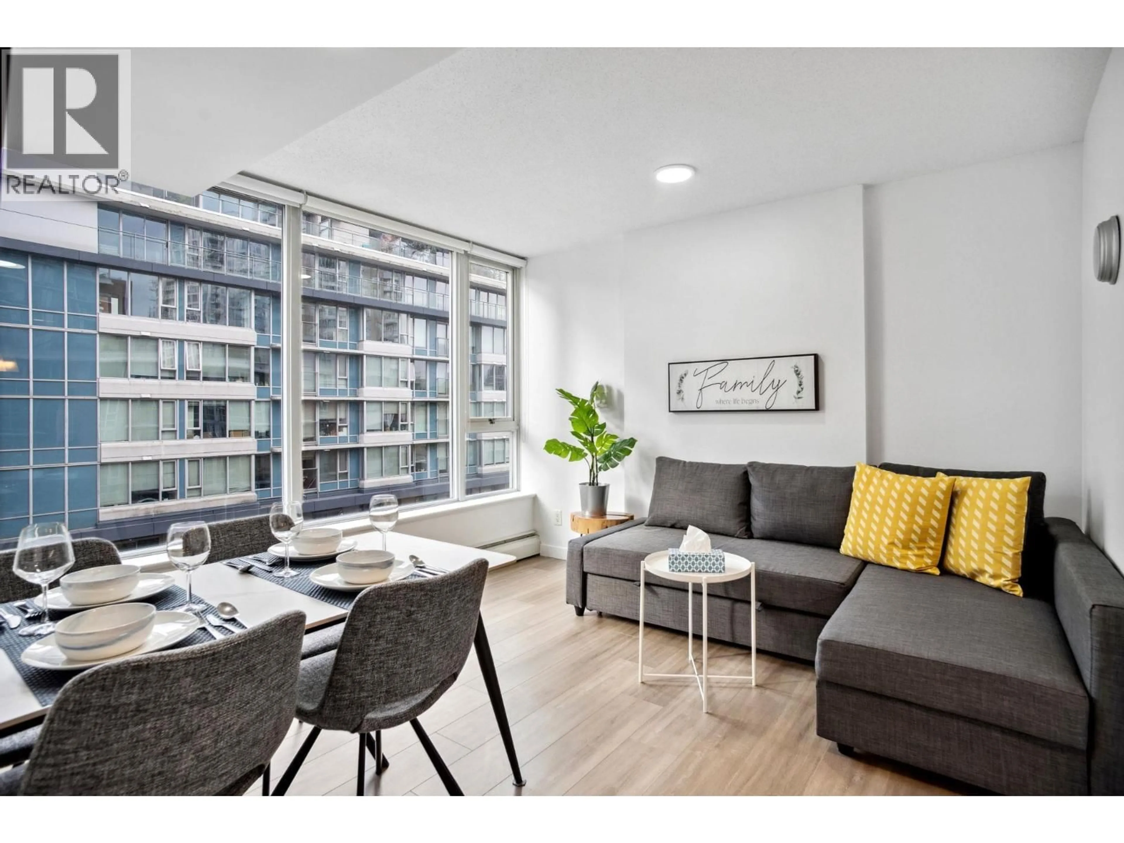 Living room with furniture, wood/laminate floor for 605 - 618 ABBOTT STREET, Vancouver British Columbia V6B0C1