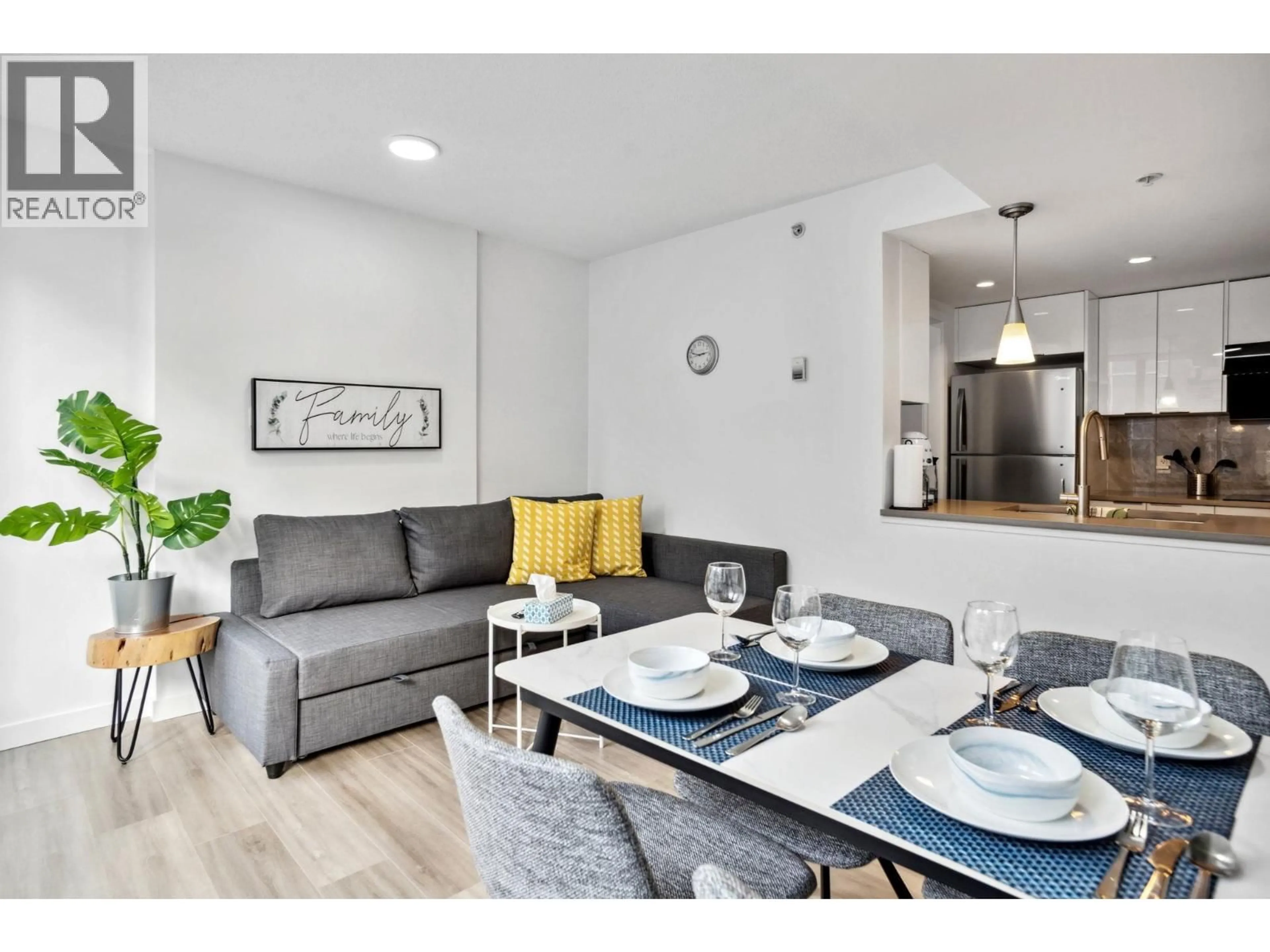 Living room with furniture, wood/laminate floor for 605 - 618 ABBOTT STREET, Vancouver British Columbia V6B0C1