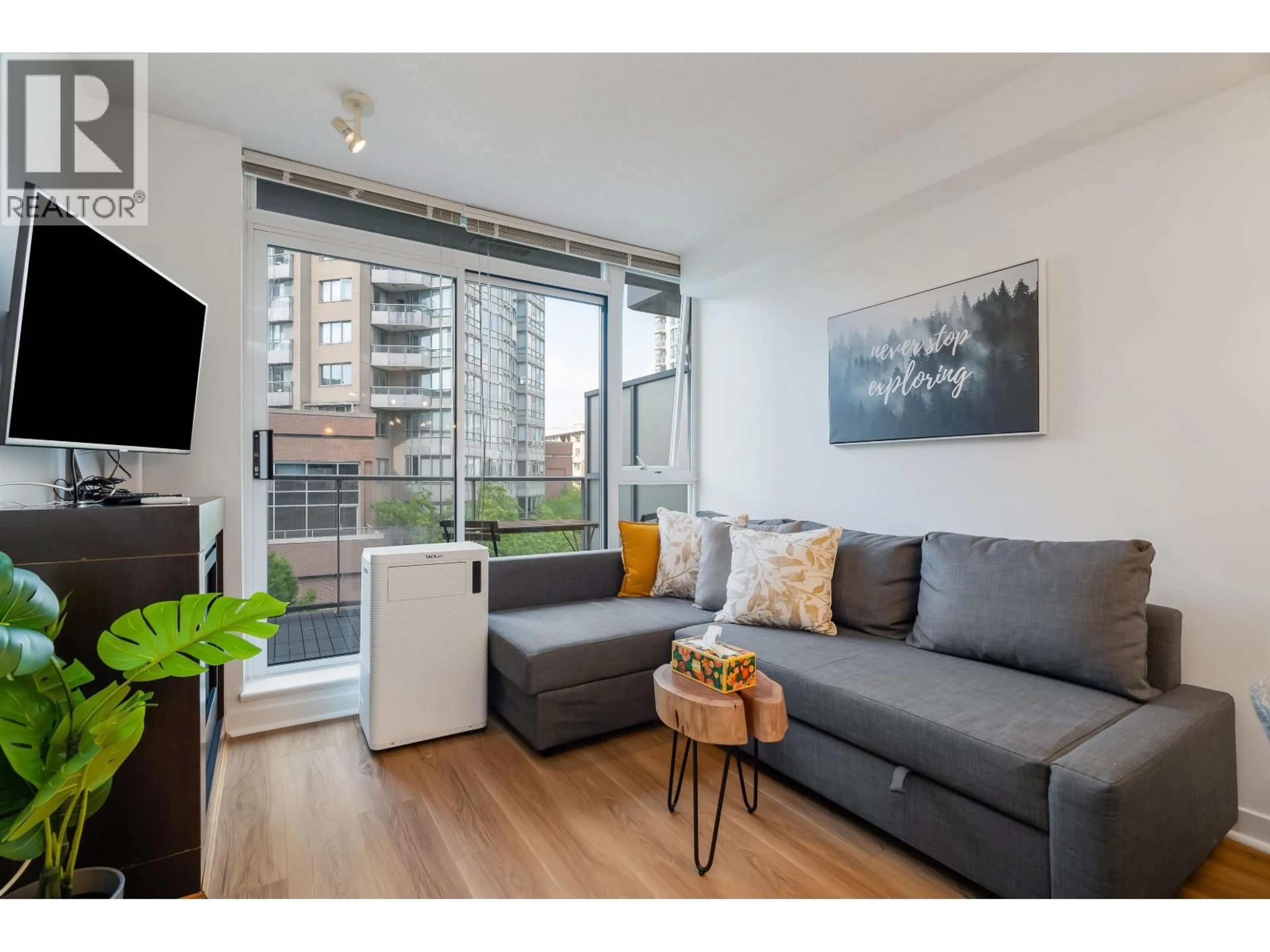 Living room with furniture, wood/laminate floor for 517 - 618 ABBOTT STREET, Vancouver British Columbia V6B0C1