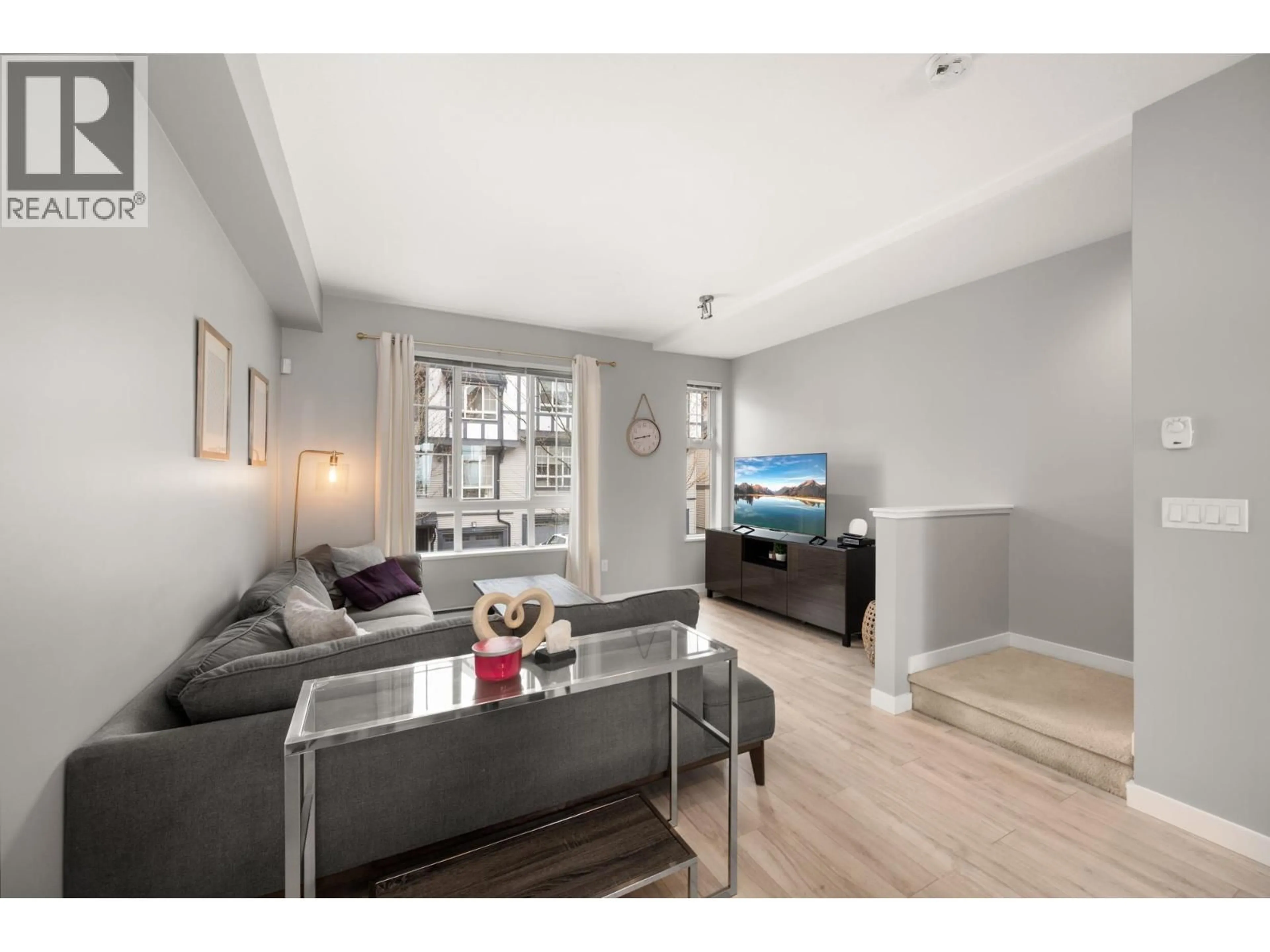 Living room with furniture, wood/laminate floor for 27 - 1338 HAMES CRESCENT, Coquitlam British Columbia V3E0J2