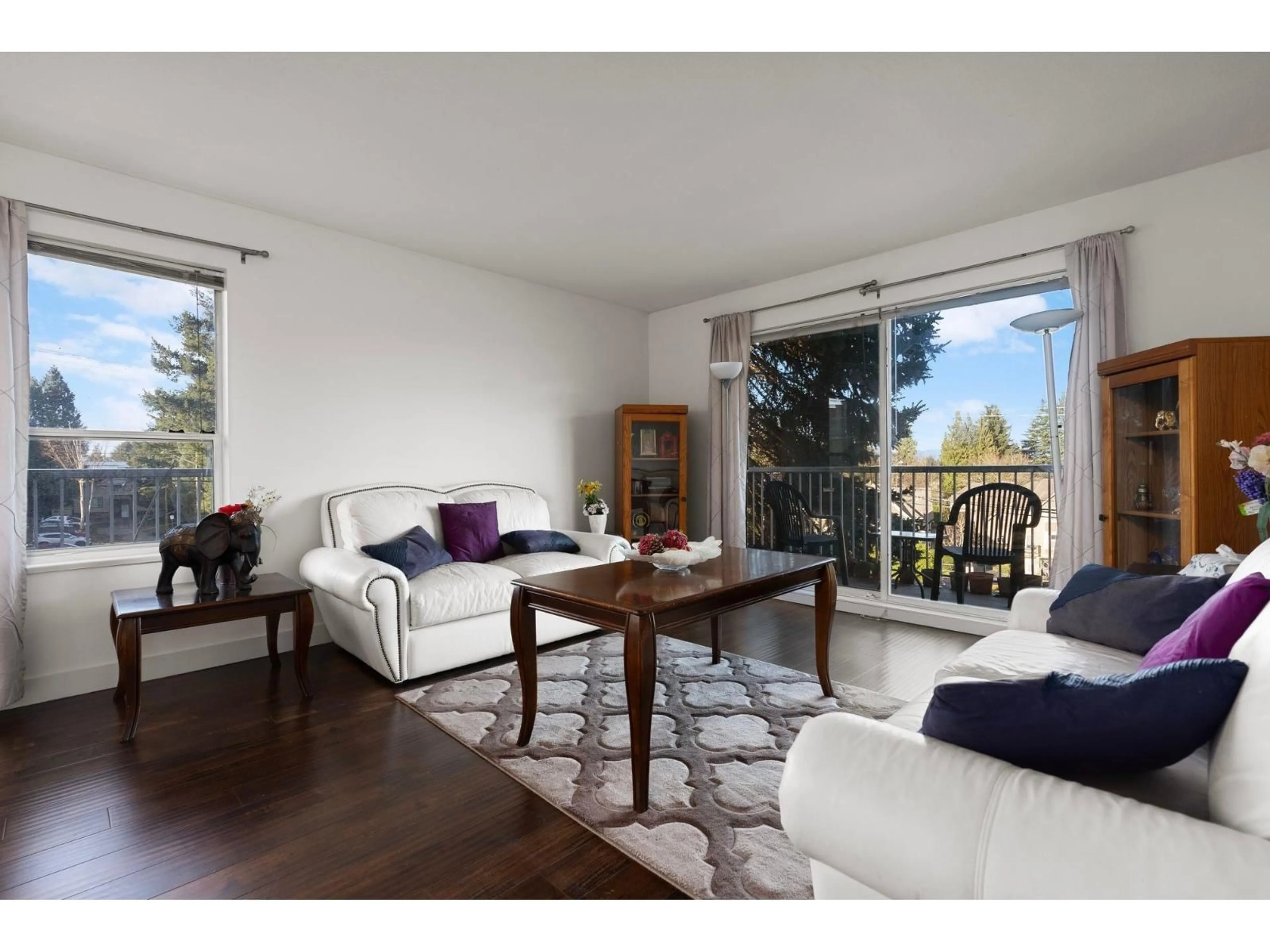 Living room with furniture, wood/laminate floor for 213 - 2750 FULLER STREET, Abbotsford British Columbia V2S3K1