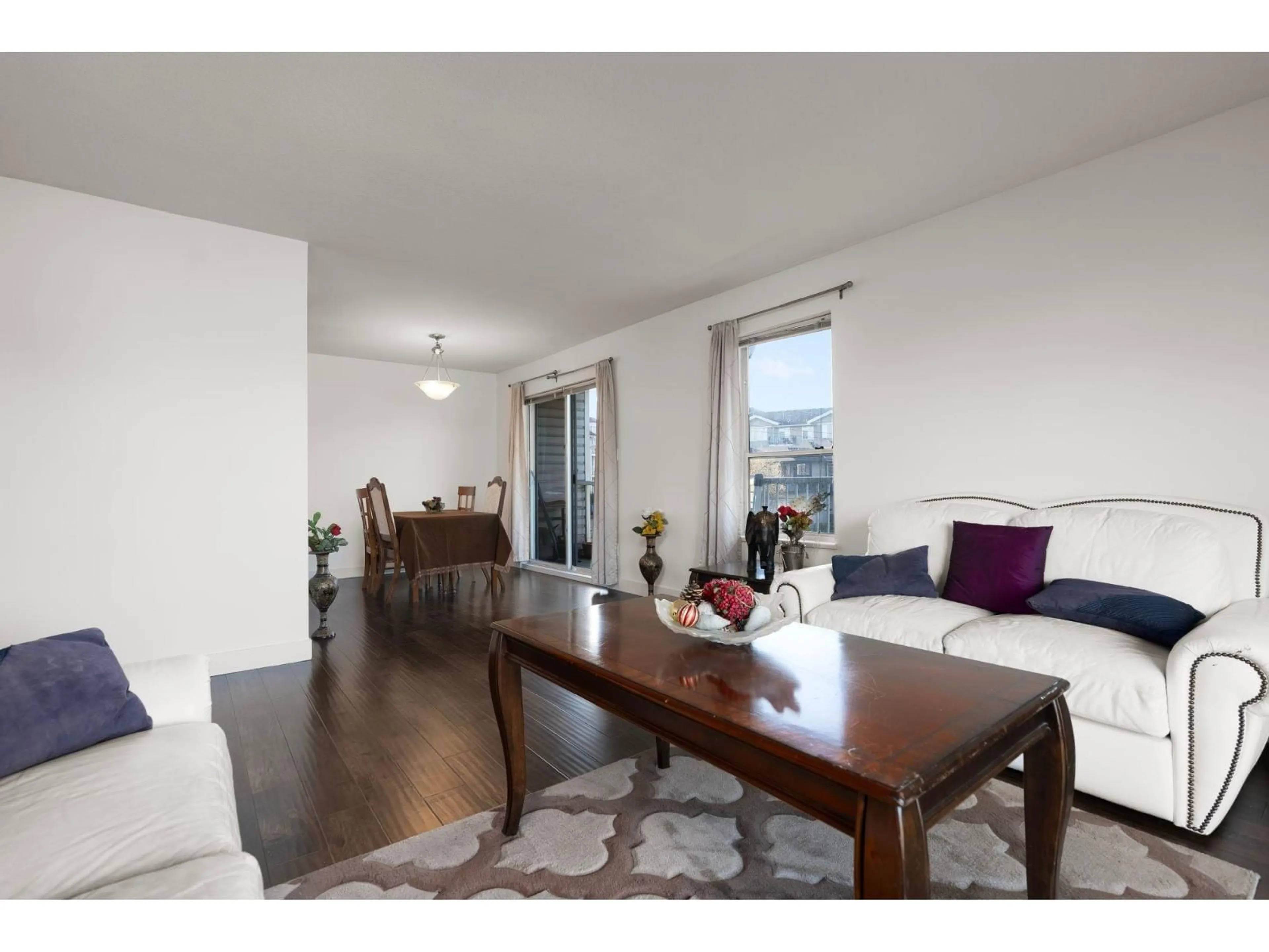 Living room with furniture, wood/laminate floor for 213 - 2750 FULLER STREET, Abbotsford British Columbia V2S3K1