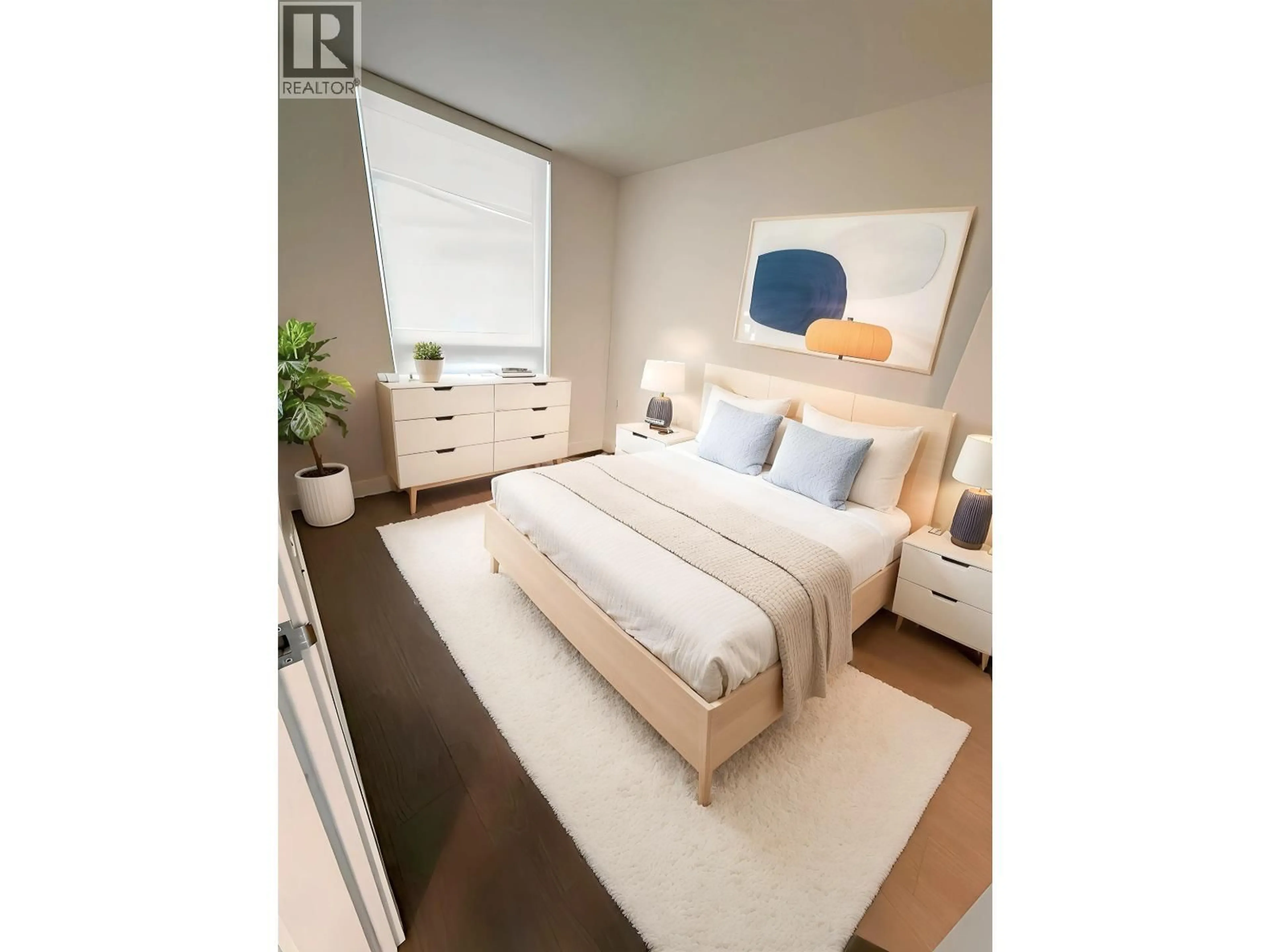 Bedroom with bed, wood/laminate floor for 617 - 6328 NO. 3 ROAD, Richmond British Columbia V6Y0L6