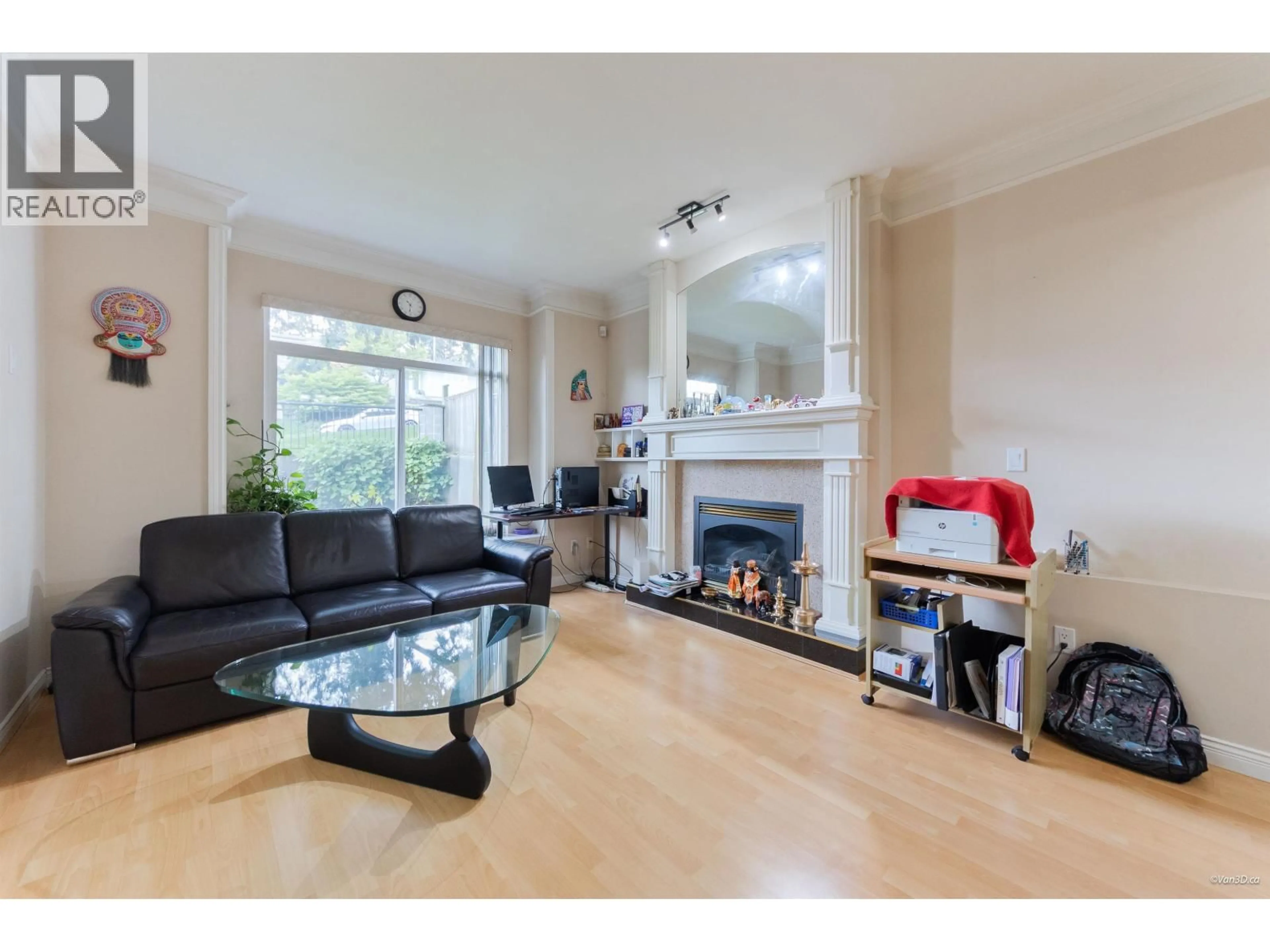 Living room with furniture, wood/laminate floor for 4191 DOMINION STREET, Burnaby British Columbia V5G1C5