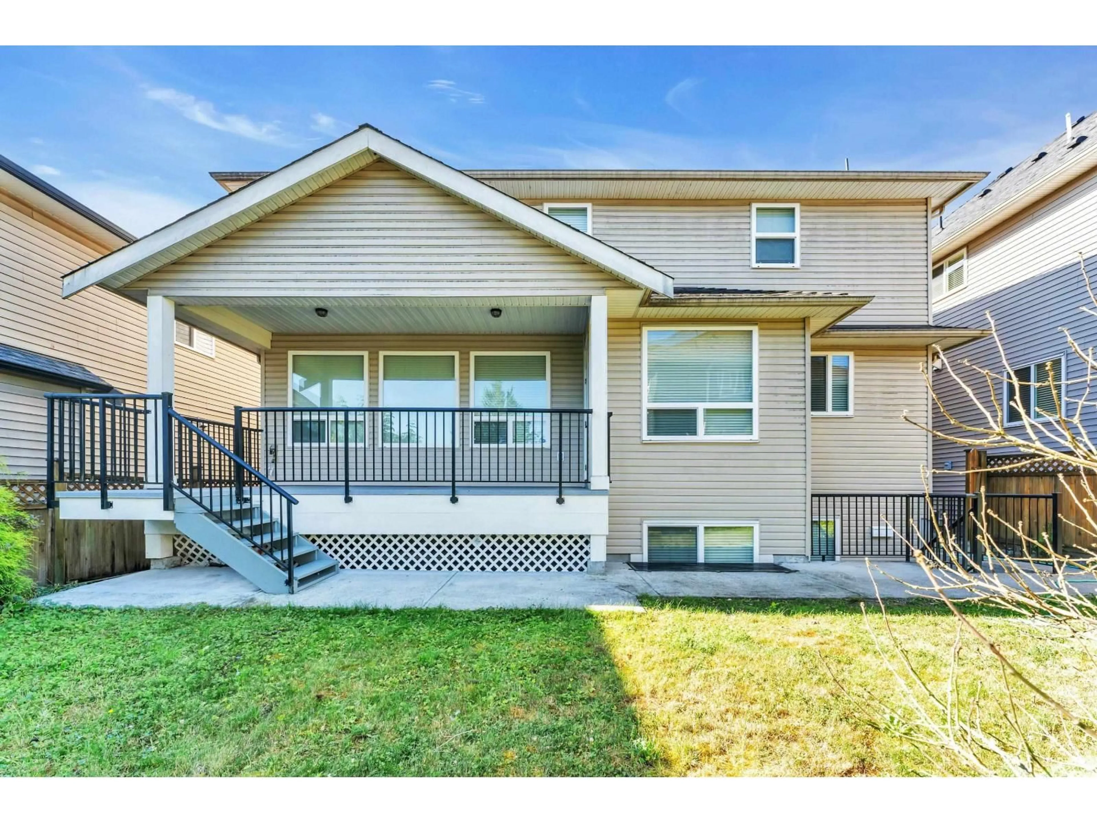 Home with vinyl exterior material, street for 21019 80B AVENUE, Langley British Columbia V2Y0K2