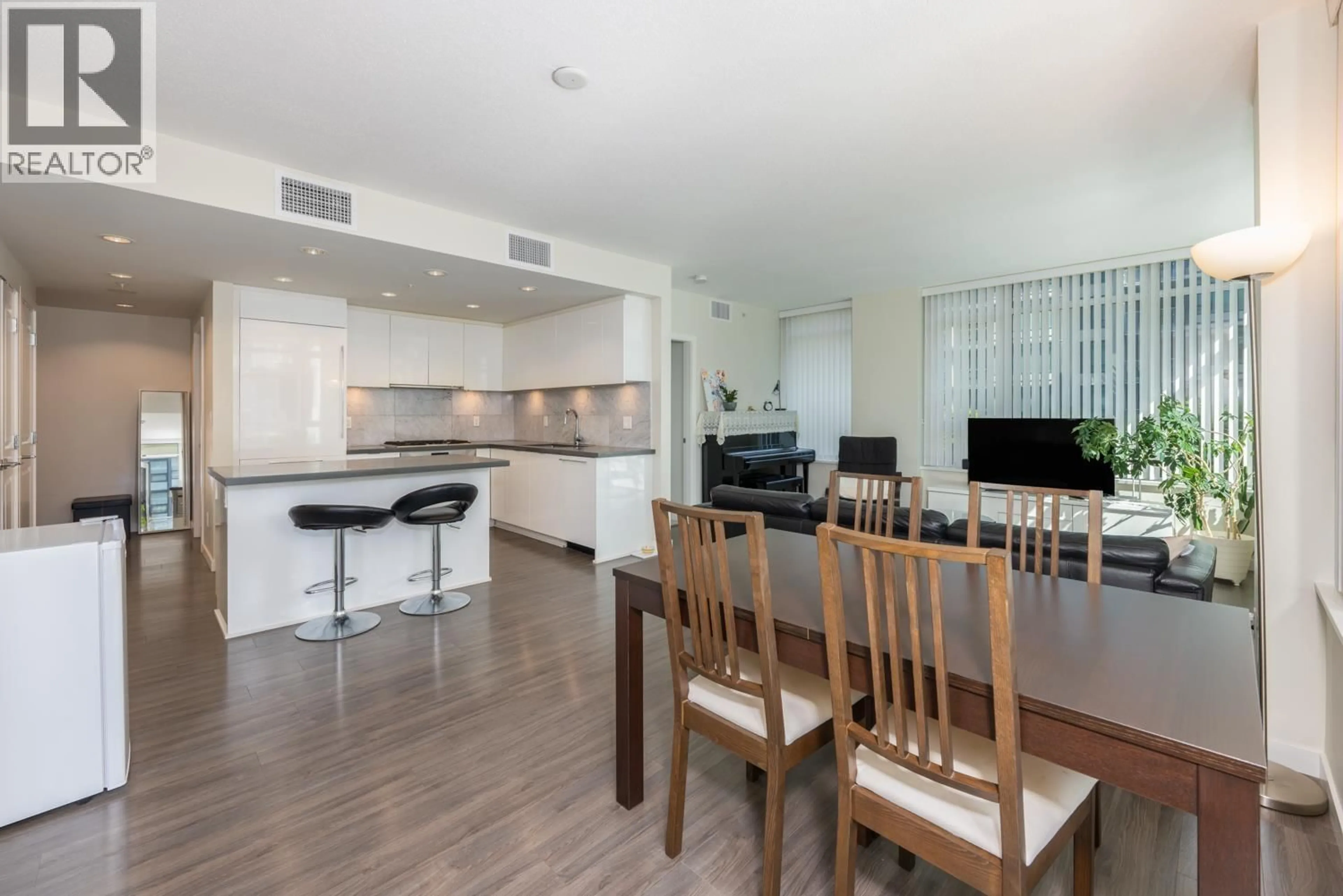 Open concept kitchen, wood/laminate floor for 709 - 7368 GOLLNER AVENUE, Richmond British Columbia V6Y0H9