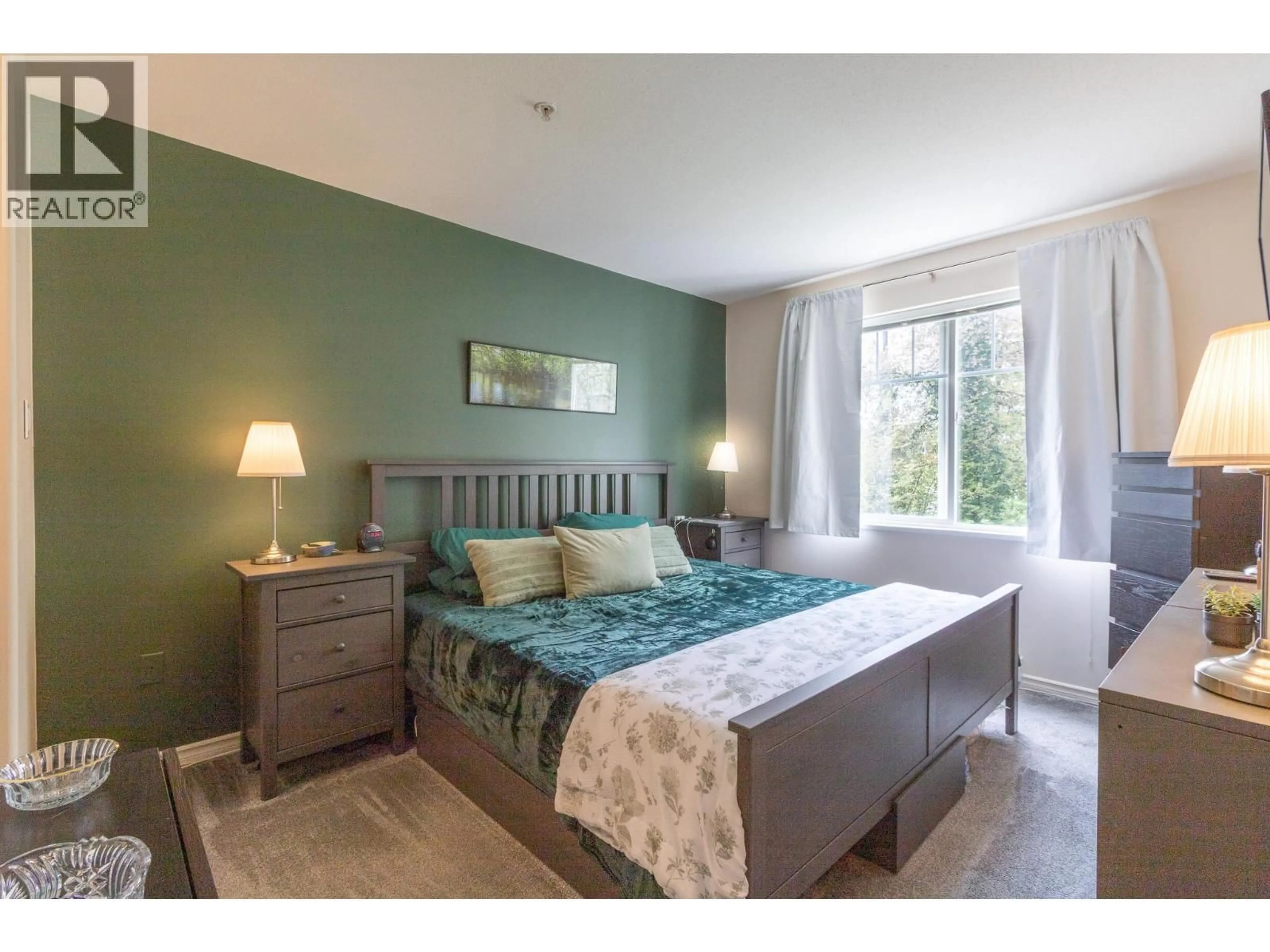 Bedroom with bed, wood/laminate floor for 205 - 12207 224 STREET, Maple Ridge British Columbia V2X6B9