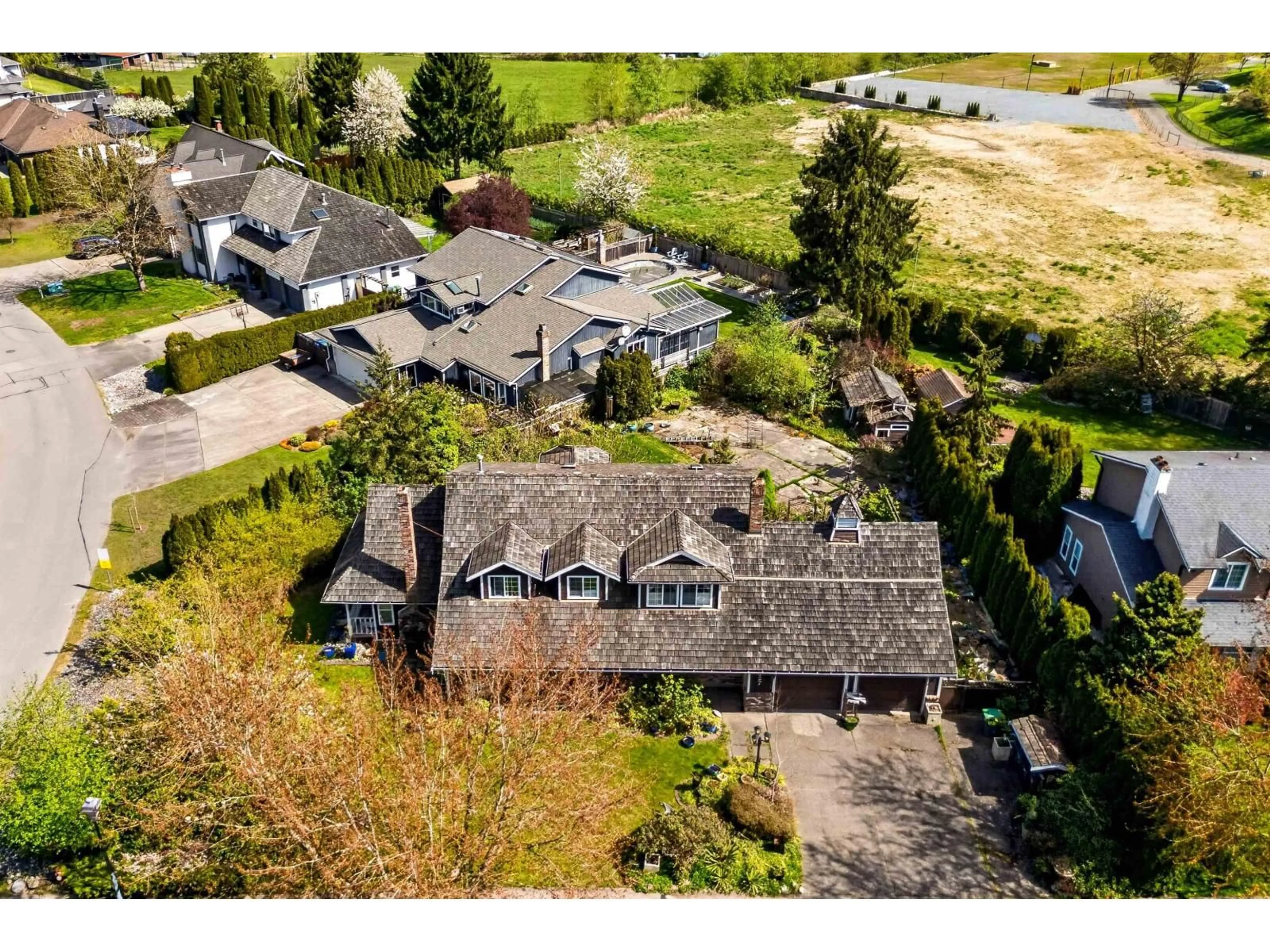 A pic from outside/outdoor area/front of a property/back of a property/a pic from drone, street for 15467 KILDARE DRIVE, Surrey British Columbia V3S6L2