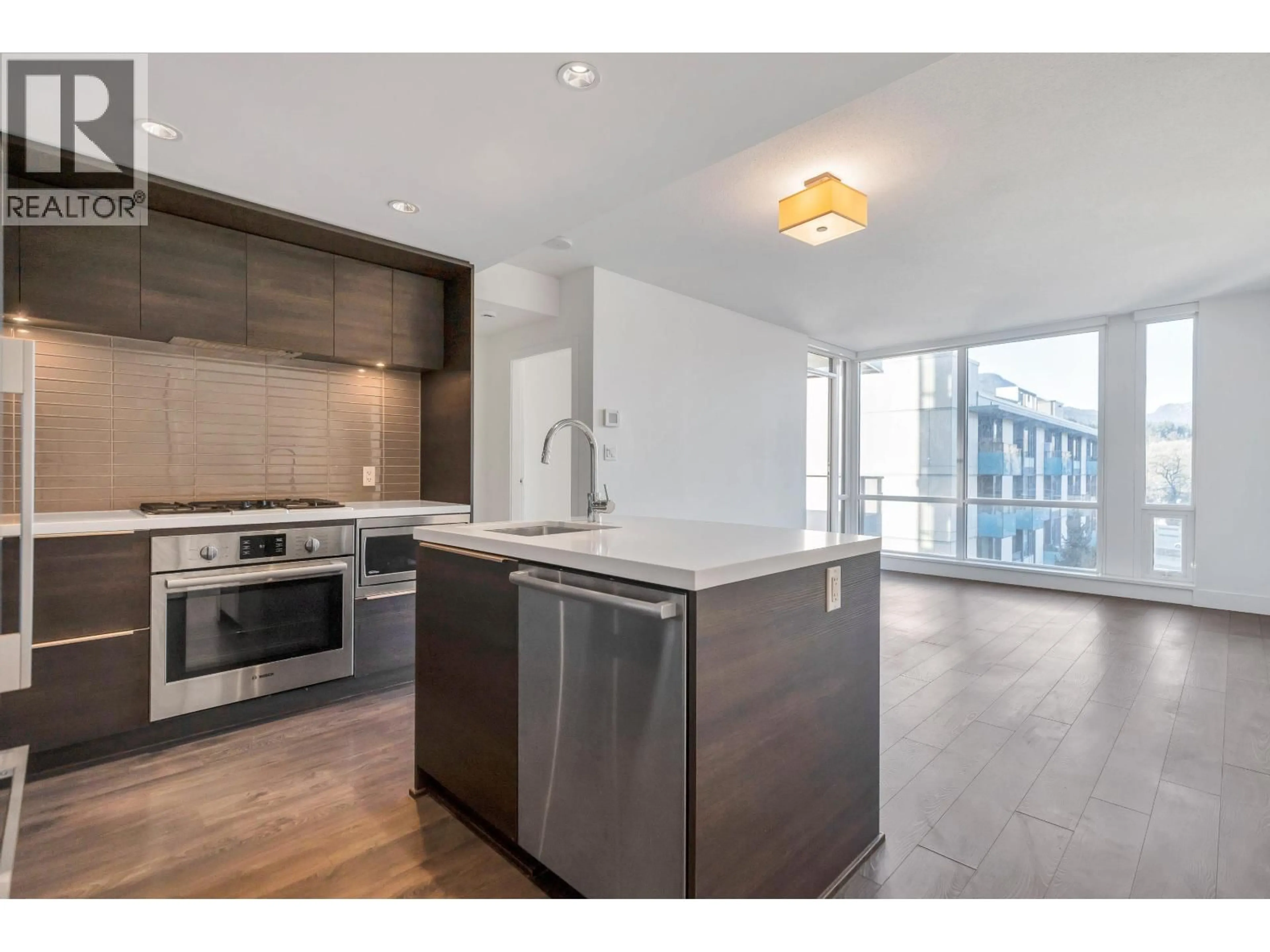 Open concept kitchen, unknown for 601 - 1550 FERN STREET, North Vancouver British Columbia V7J0A9