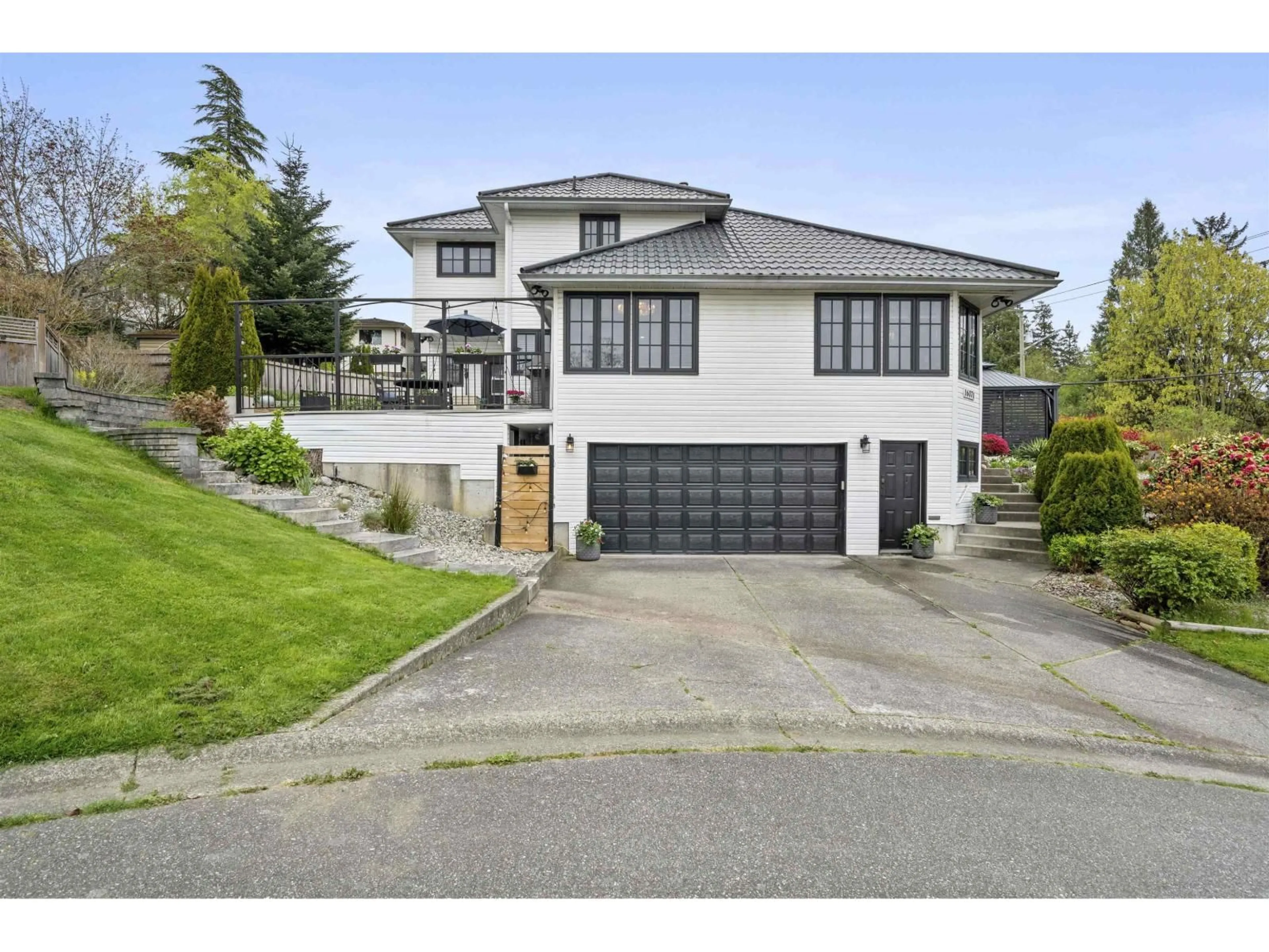 Home with vinyl exterior material, street for 16071 8 AVENUE, Surrey British Columbia V4A1A1