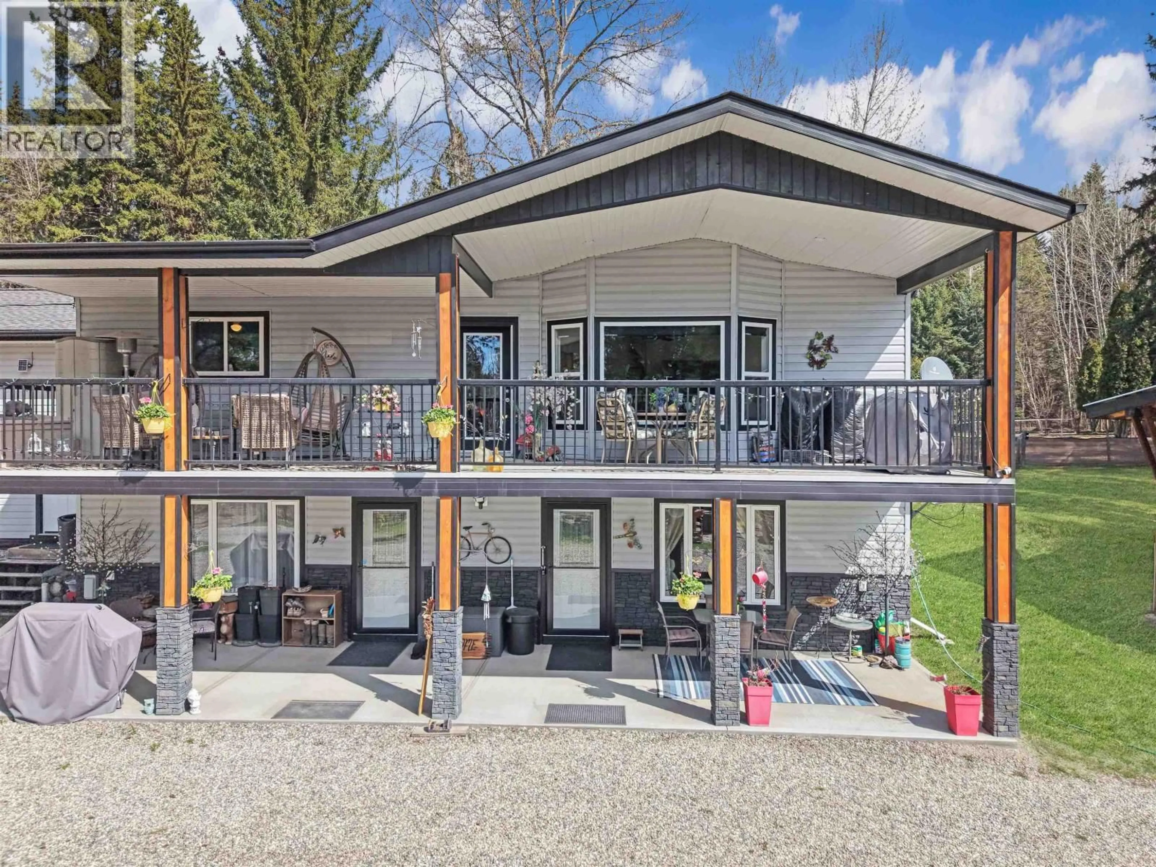 A pic from outside/outdoor area/front of a property/back of a property/a pic from drone, mountain view for 3479 LOLOFF ROAD, Quesnel British Columbia V2J6E5