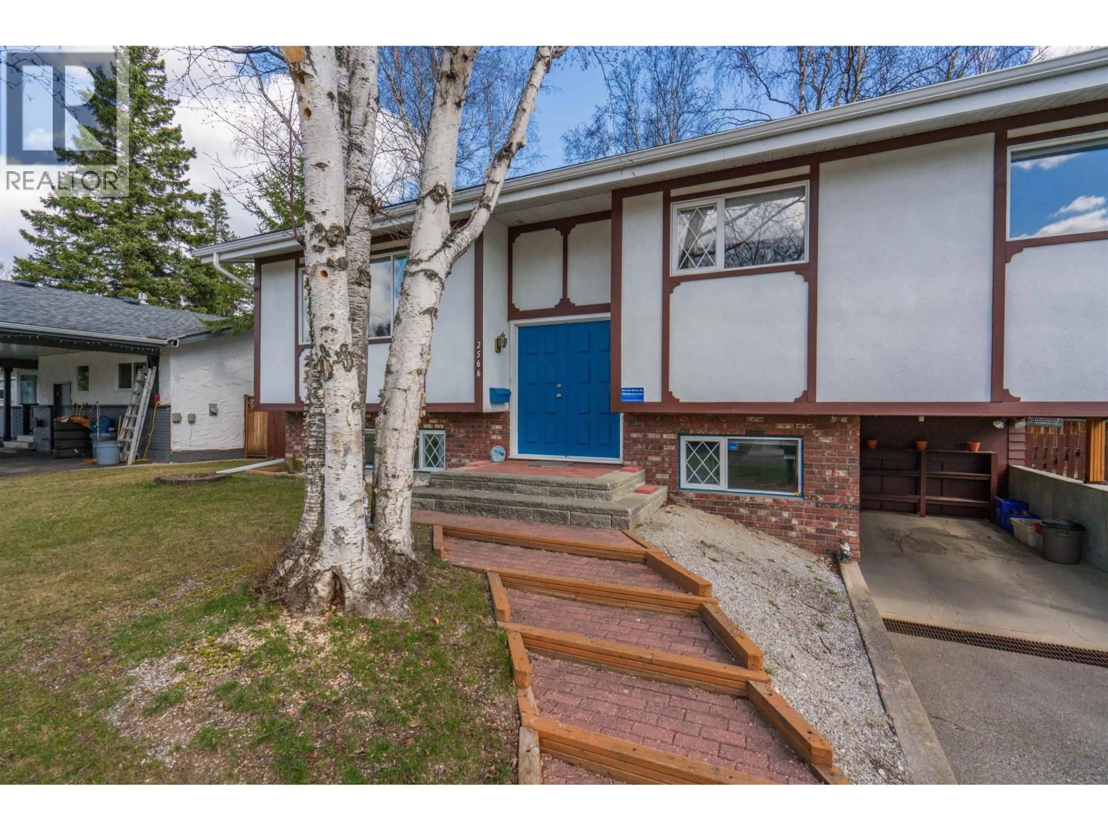 Home with vinyl exterior material, street for 2566 BORDEN CRESCENT, Prince George British Columbia V2L2X5