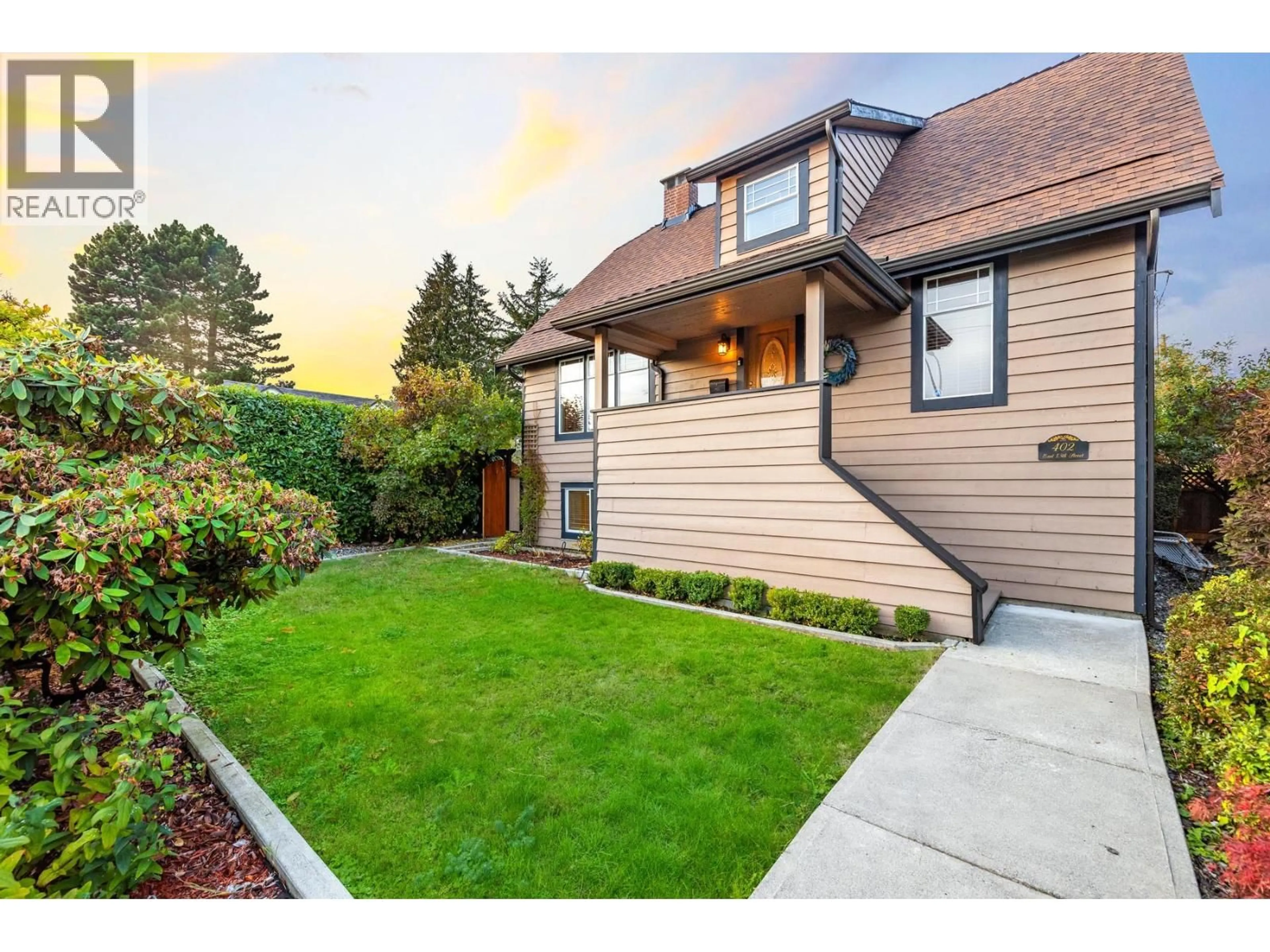 Home with brick exterior material, street for 402 13TH STREET, North Vancouver British Columbia V7L2M1