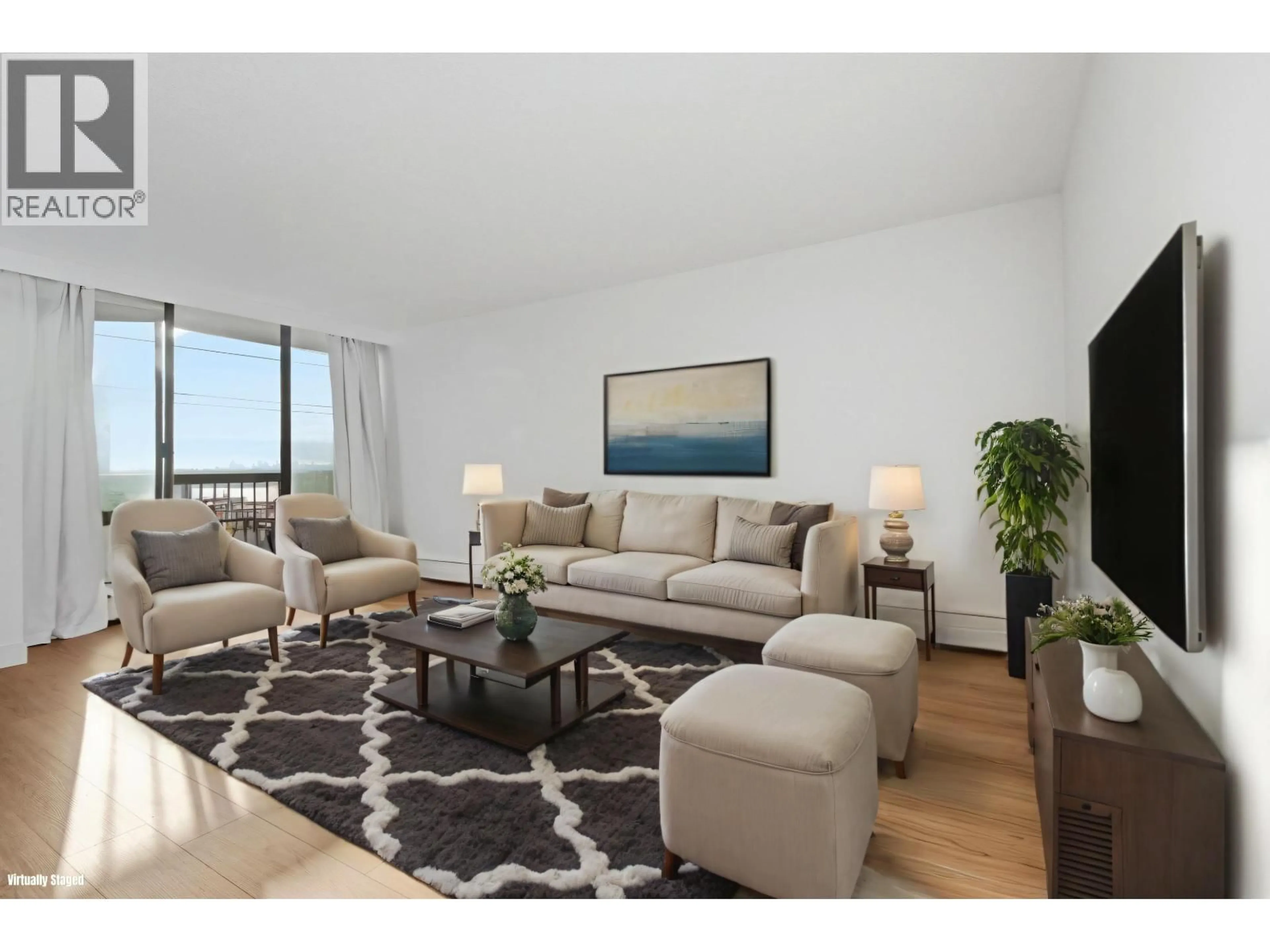 Living room with furniture, wood/laminate floor for 407 - 145 ST. GEORGES AVENUE, North Vancouver British Columbia V7L3G8
