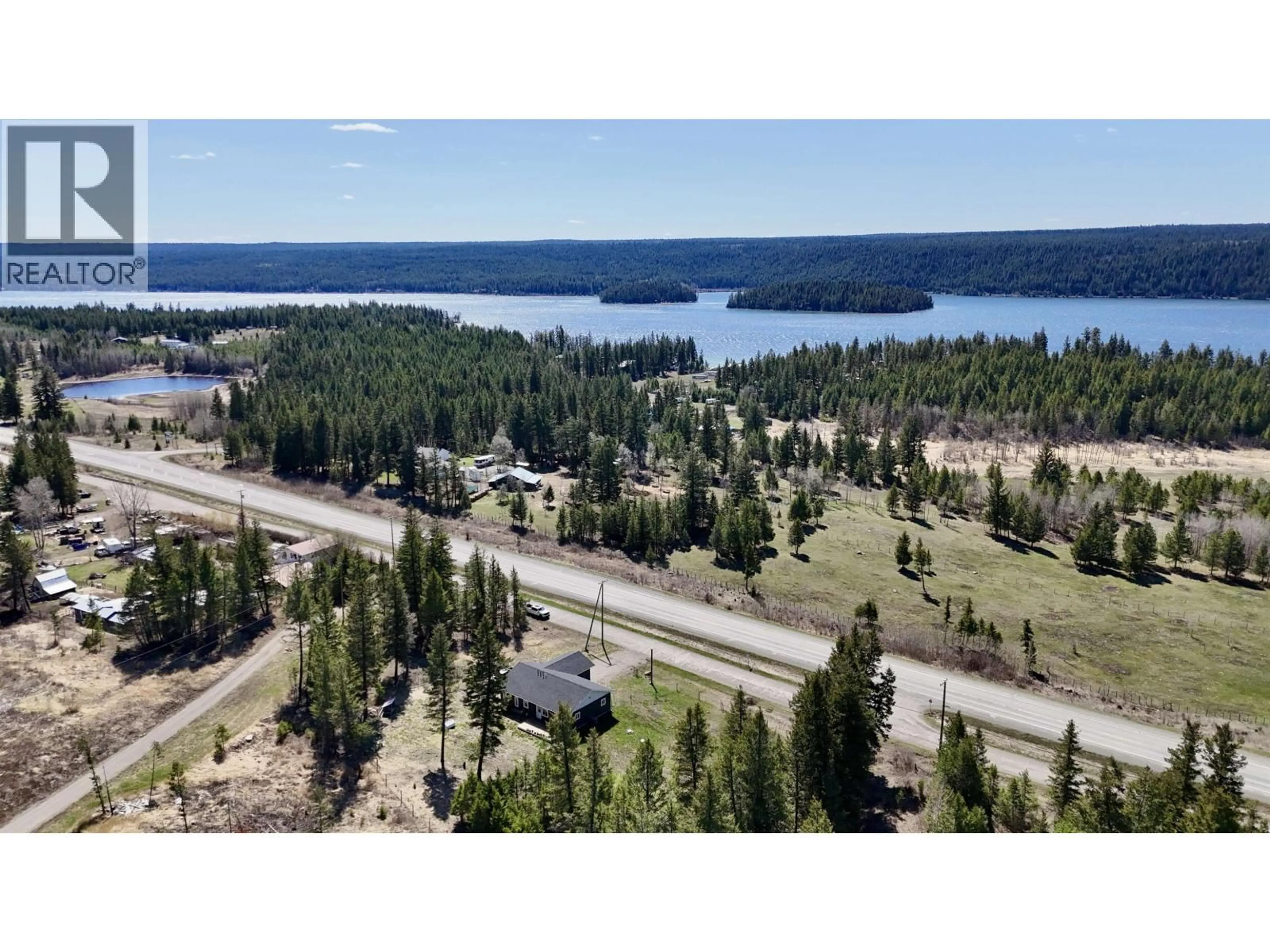A pic from outside/outdoor area/front of a property/back of a property/a pic from drone, water/lake/river/ocean view for 3791 DODGE ROAD, Lac La Hache British Columbia V0K1T1