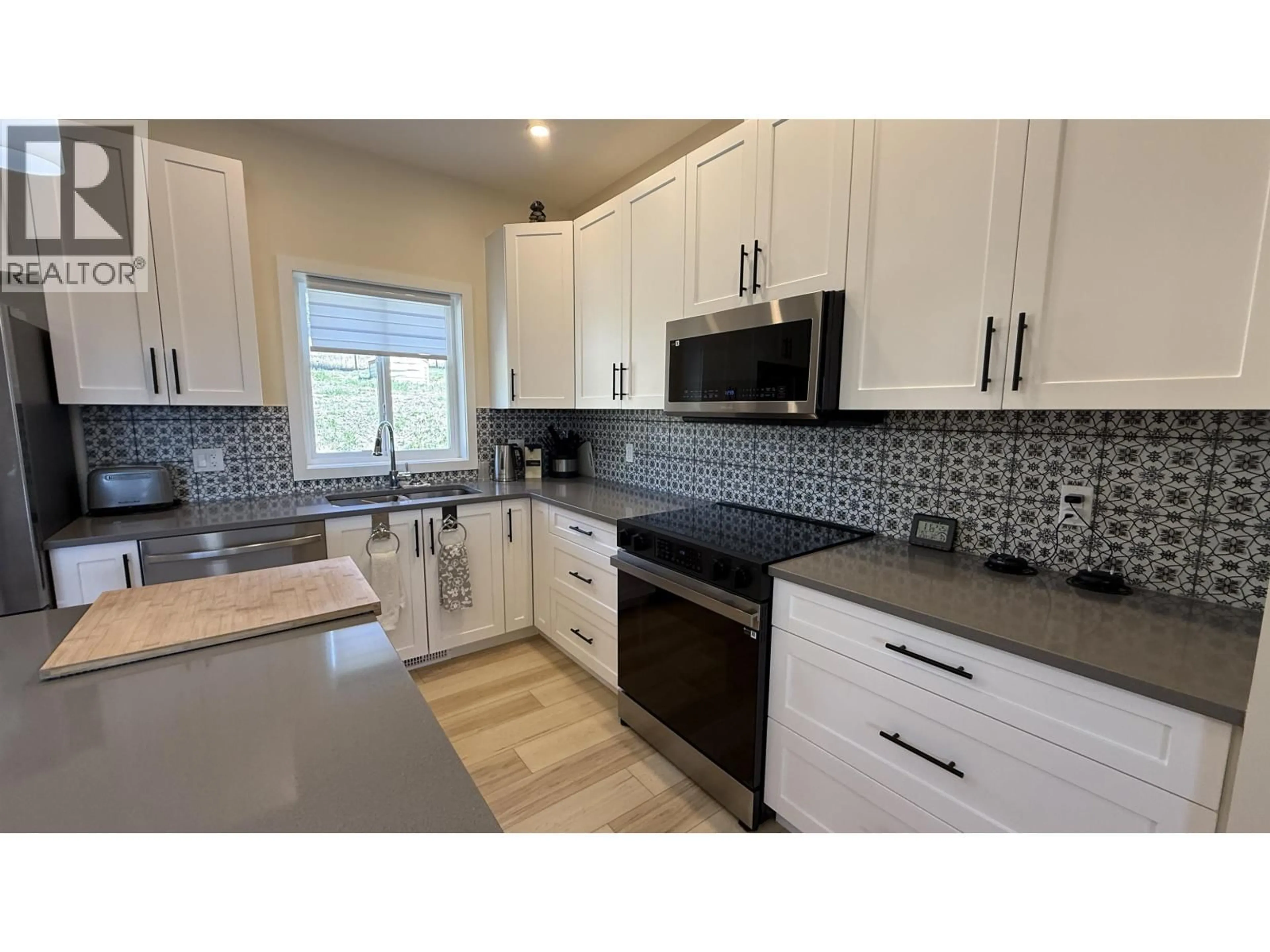 Open concept kitchen, ceramic/tile floor for 3791 DODGE ROAD, Lac La Hache British Columbia V0K1T1