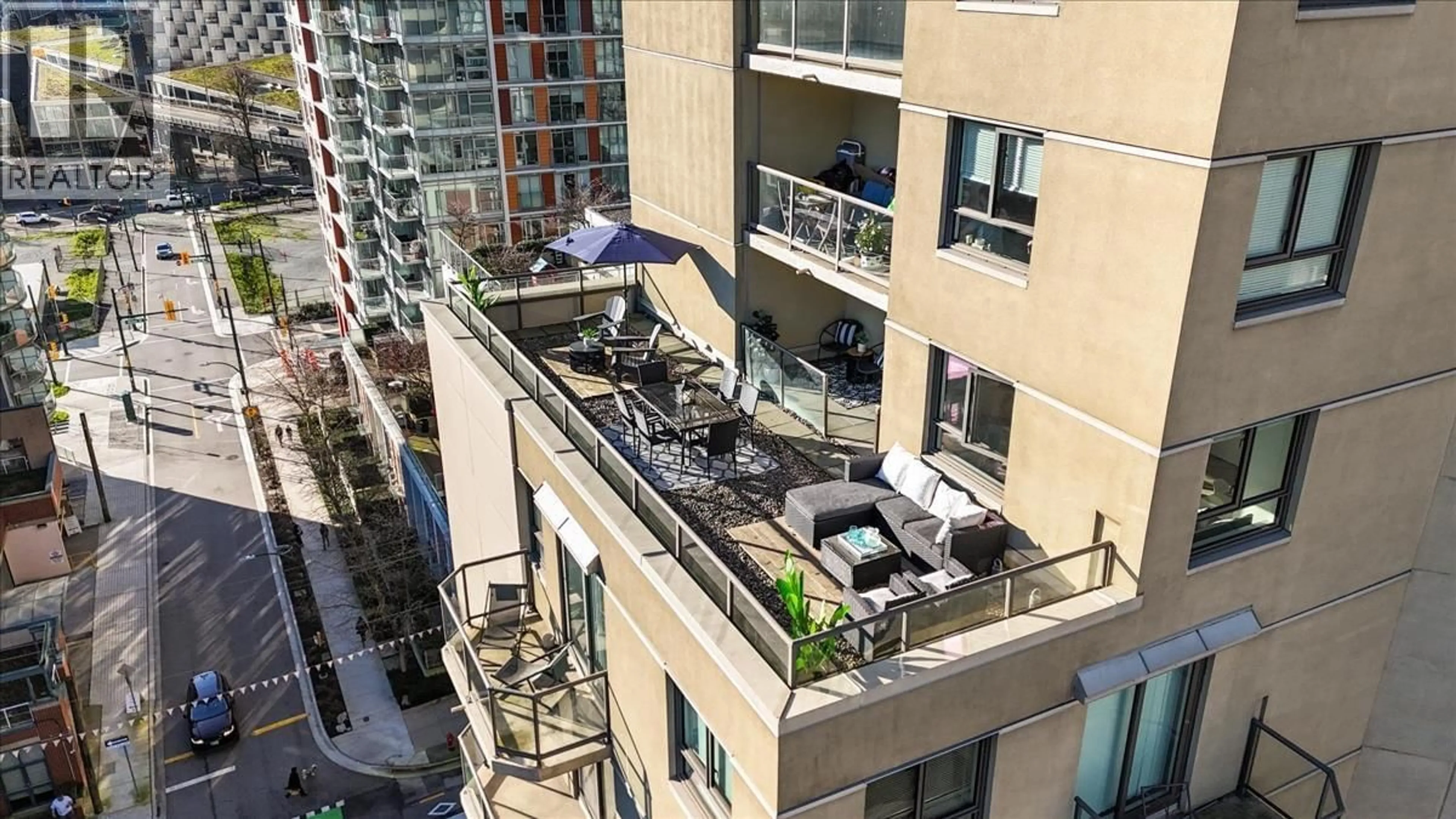 Patio, city buildings view from balcony for 1006 - 789 DRAKE STREET, Vancouver British Columbia V6Z2N7