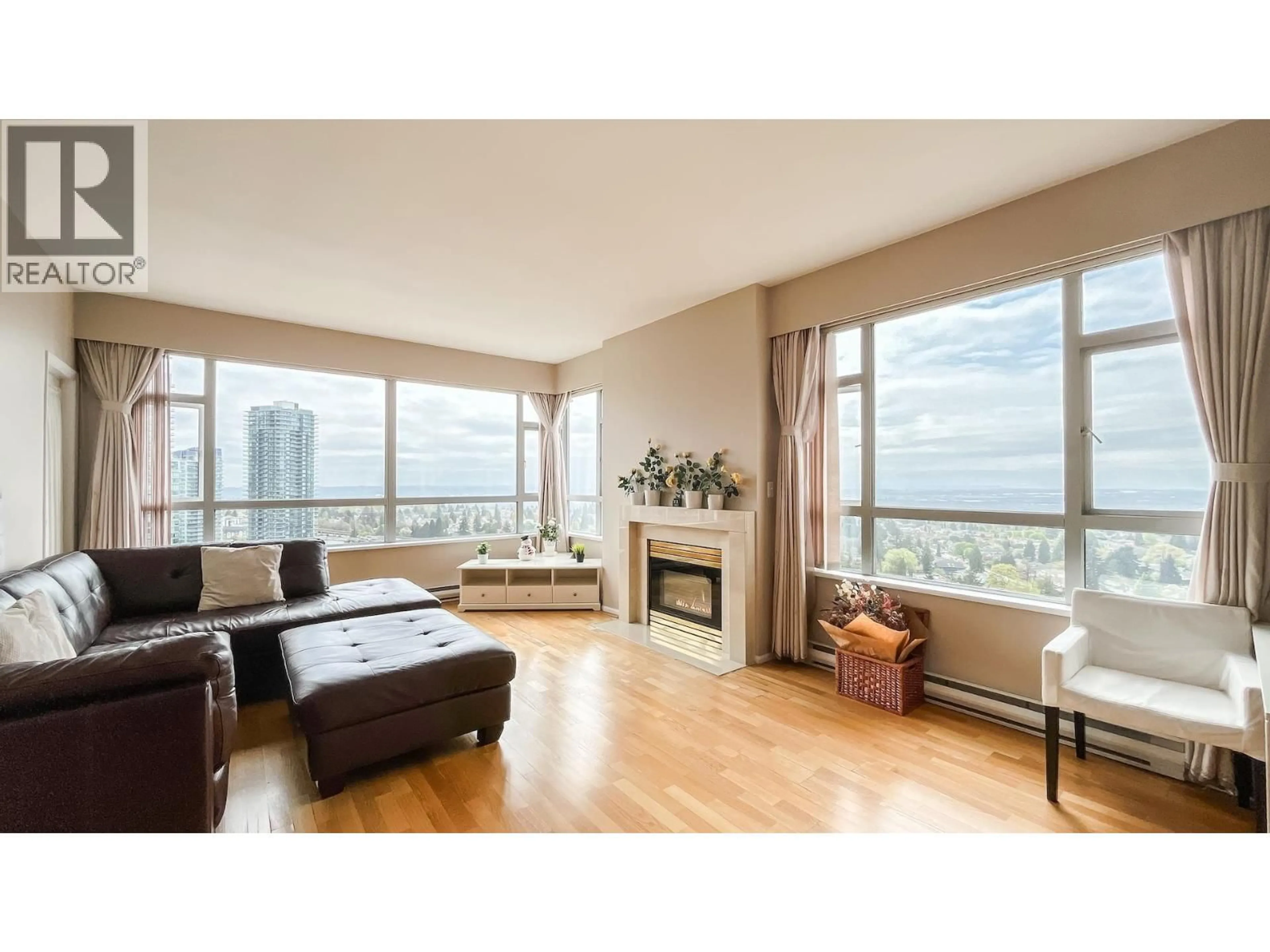 Living room with furniture, wood/laminate floor for 2102 - 6521 BONSOR AVENUE, Burnaby British Columbia V5H4N3