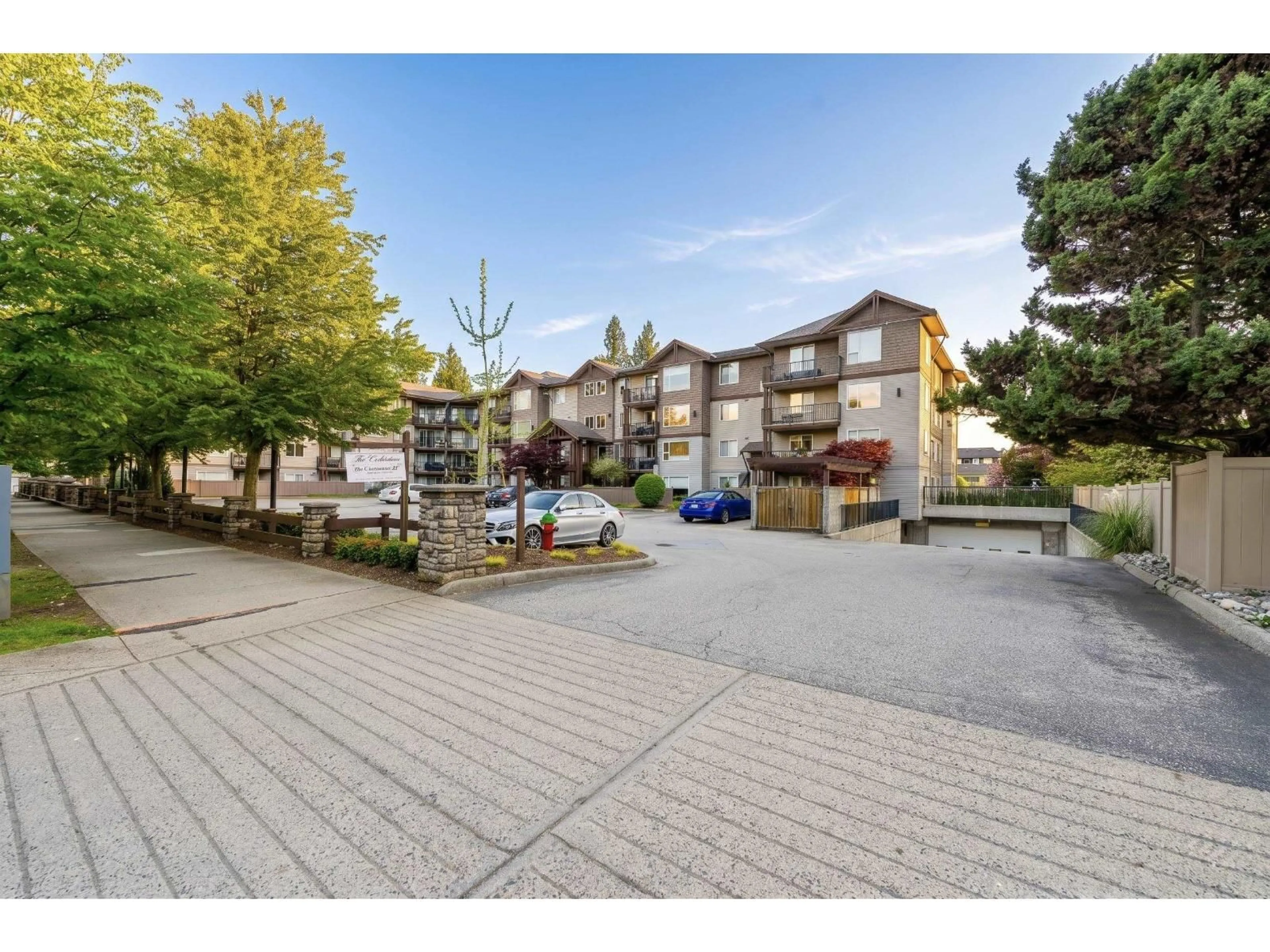A pic from outside/outdoor area/front of a property/back of a property/a pic from drone, street for 308 - 2581 LANGDON STREET, Abbotsford British Columbia V2T7A3