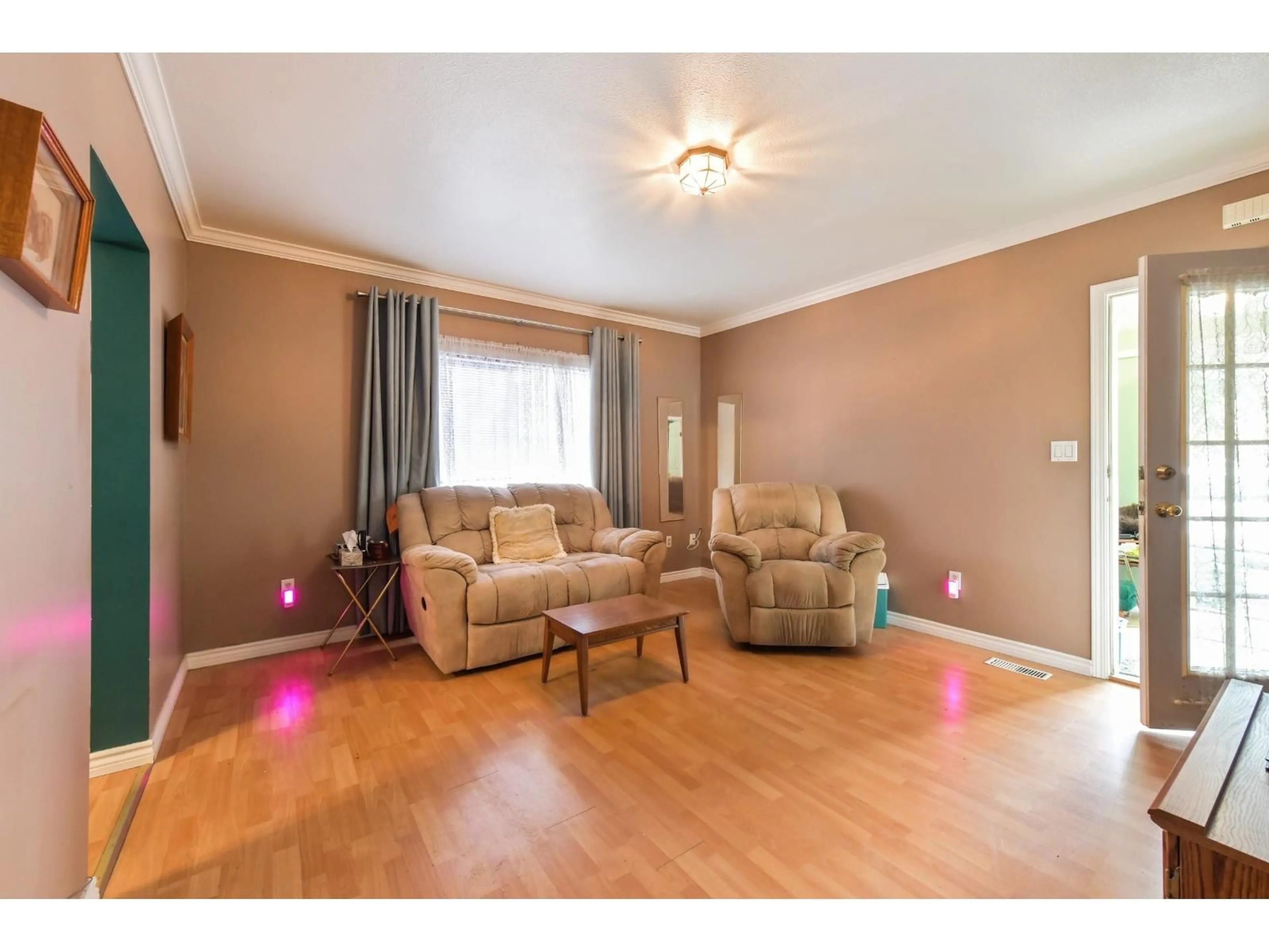 Living room with furniture, wood/laminate floor for 7544 MURRAY STREET, Mission British Columbia V2V4B1