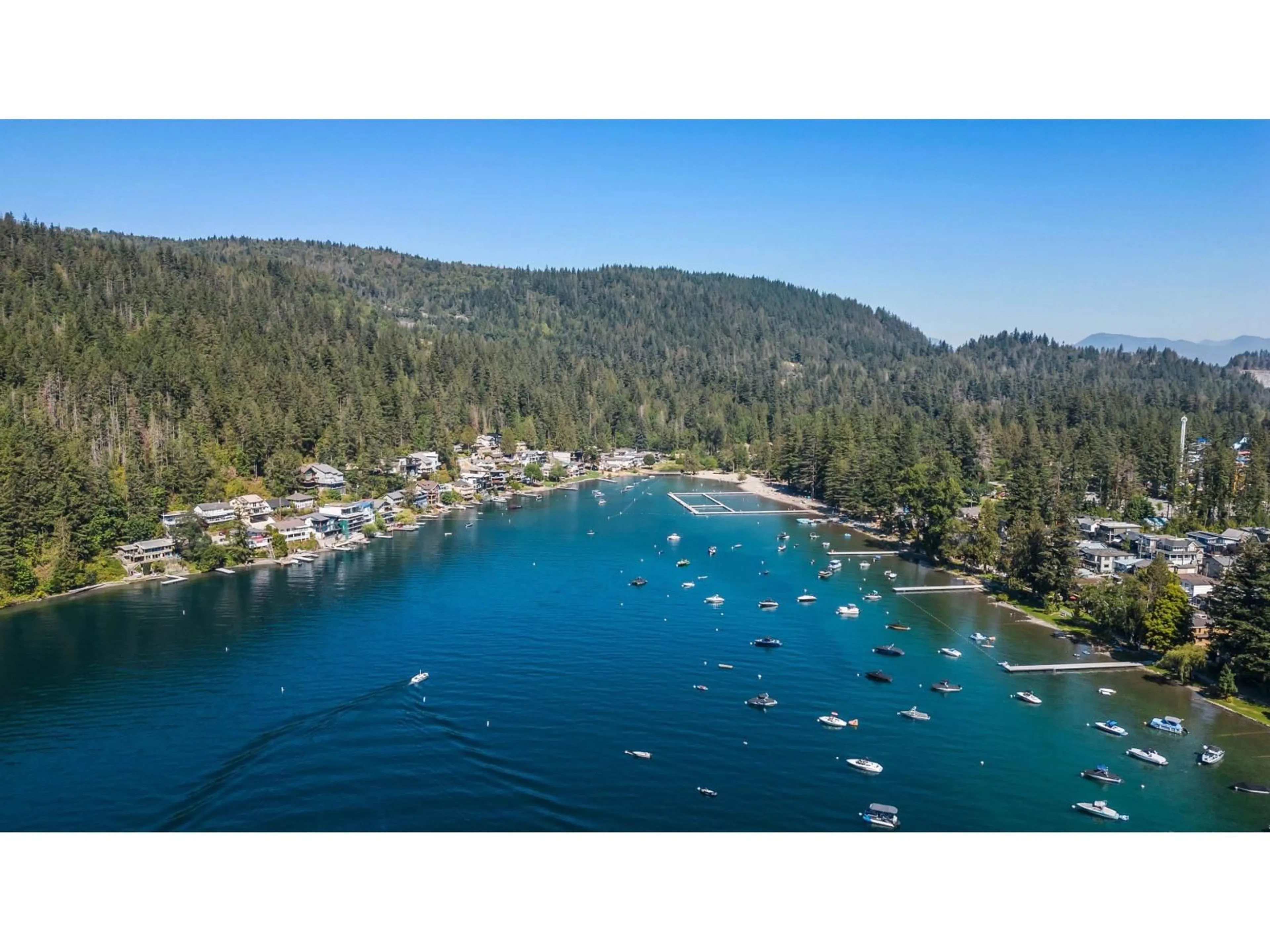 A pic from outside/outdoor area/front of a property/back of a property/a pic from drone, water/lake/river/ocean view for 217 LAKESHORE DRIVE, Cultus Lake British Columbia V2R5A1