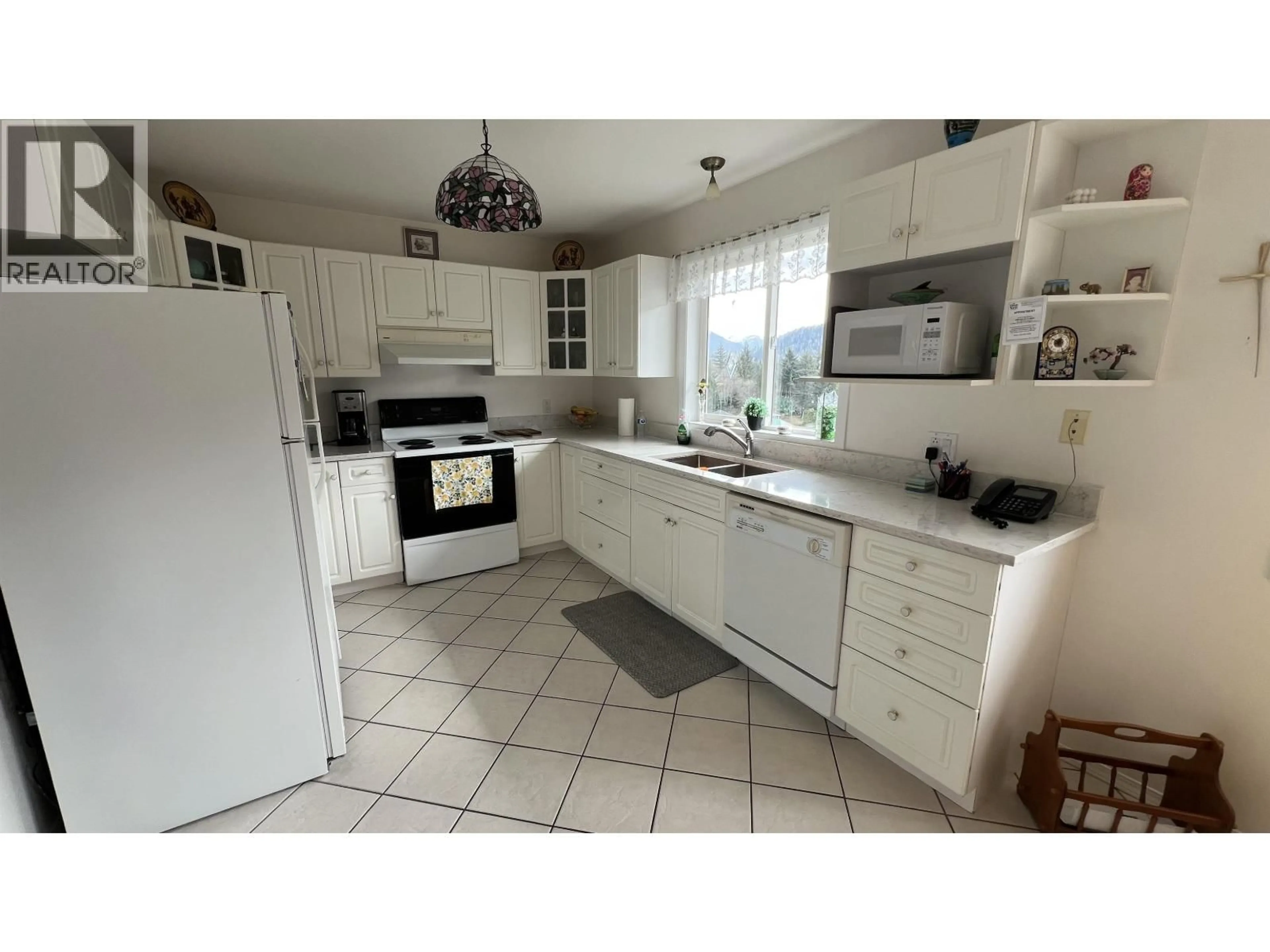 Standard kitchen, ceramic/tile floor for 323 5TH AVENUE, Prince Rupert British Columbia V8J1T6