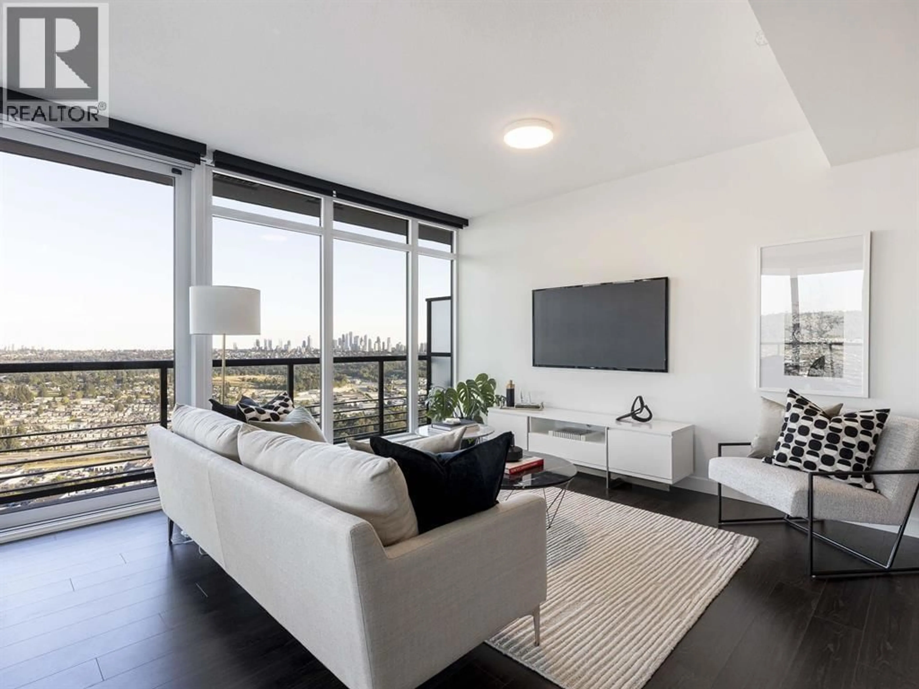 Living room with furniture, unknown for 4708 - 4730 LOUGHEED HIGHWAY, Burnaby British Columbia V5C0M9