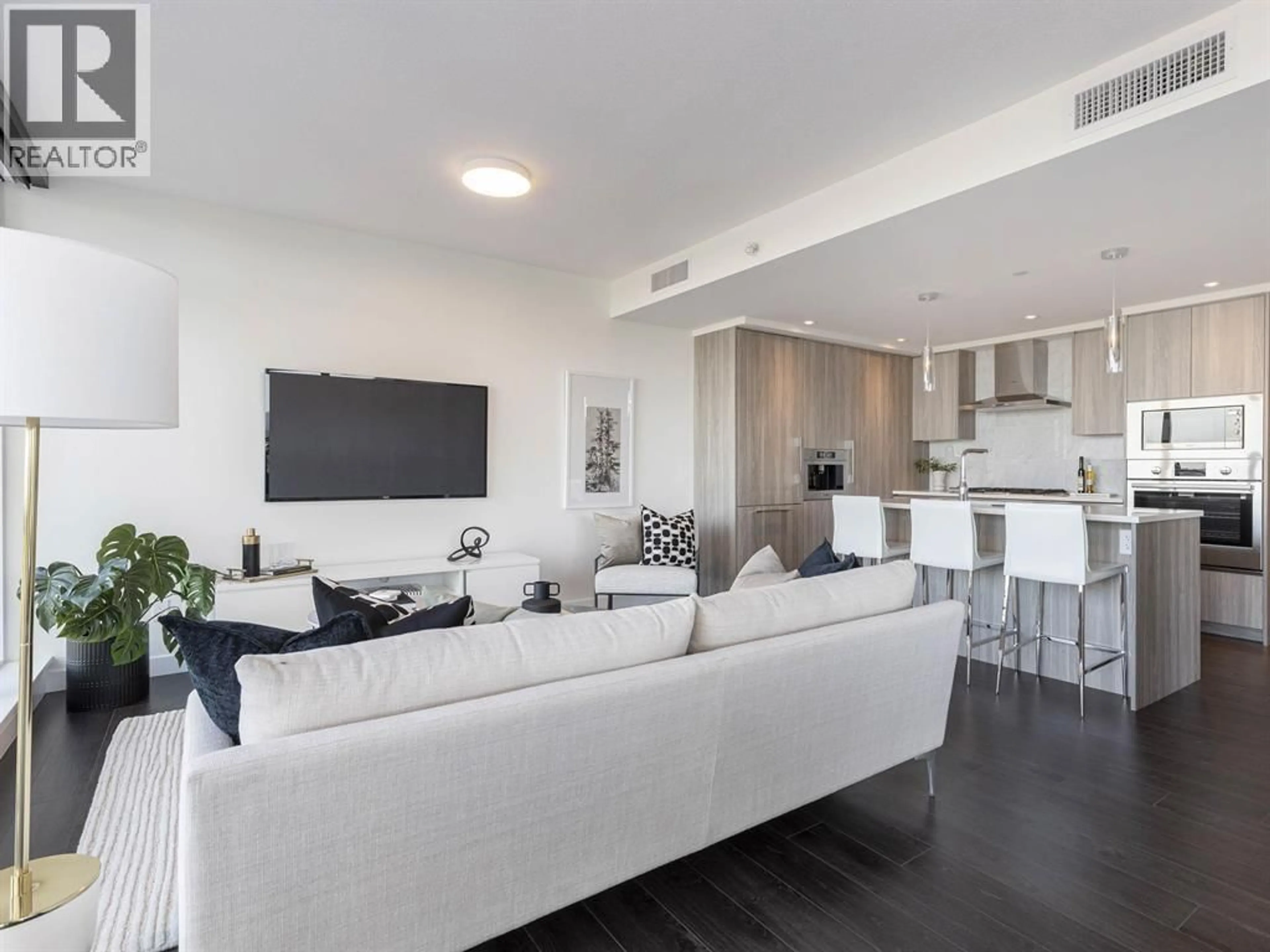 Living room with furniture, unknown for 4708 - 4730 LOUGHEED HIGHWAY, Burnaby British Columbia V5C0M9