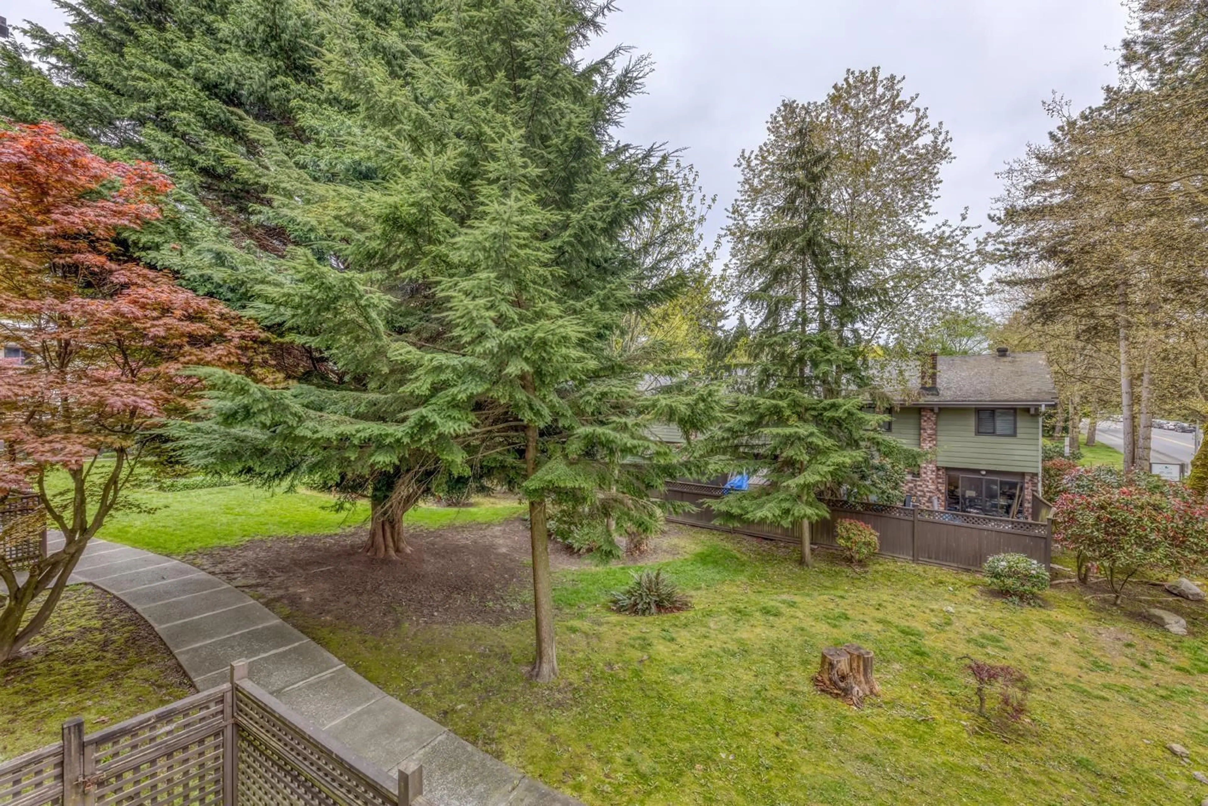 Patio, forest/trees view for 205 - 7426 138TH, Surrey British Columbia V3W6G4