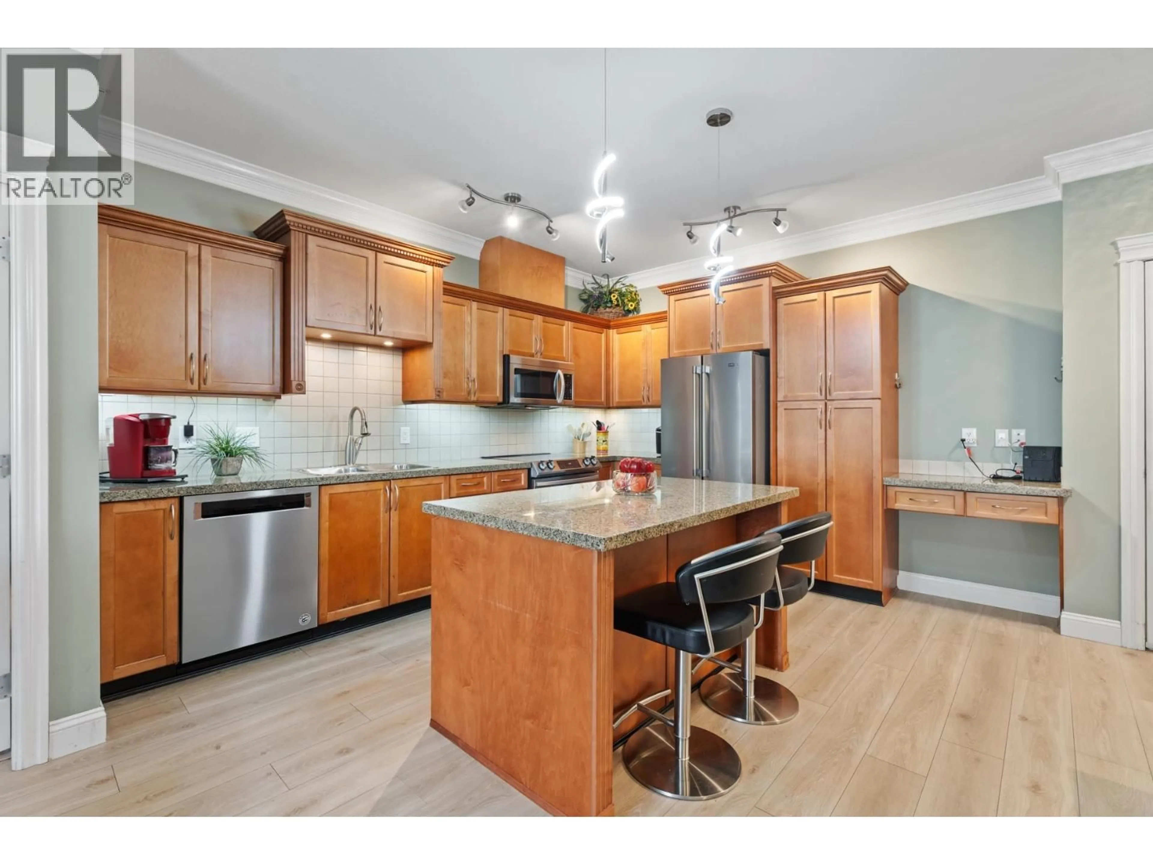 Open concept kitchen, unknown for 409 - 22150 DEWDNEY TRUNK ROAD, Maple Ridge British Columbia V2X3H6