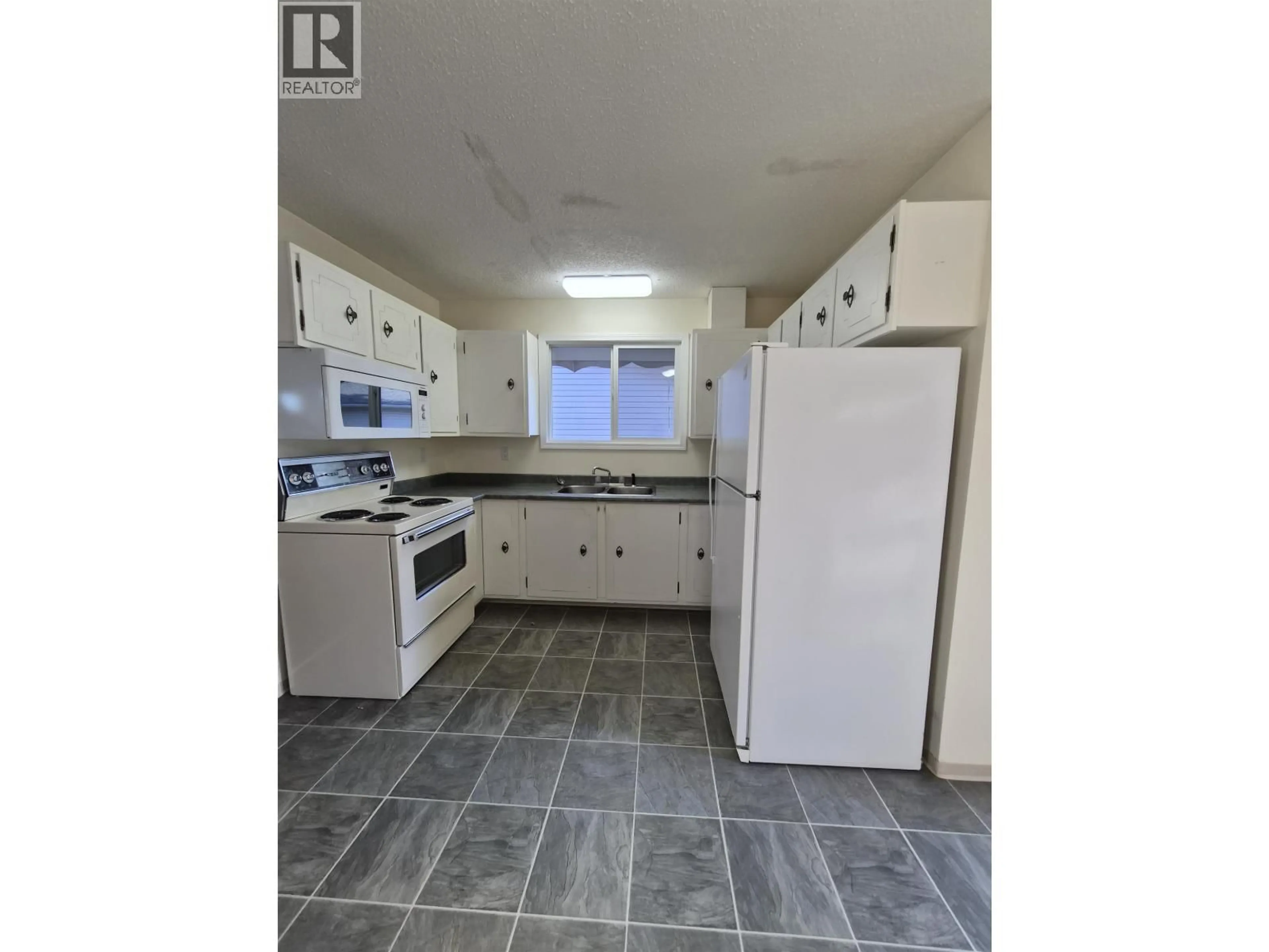 Standard kitchen, ceramic/tile floor for 1351 JARVIS STREET, Prince George British Columbia V2M4J3